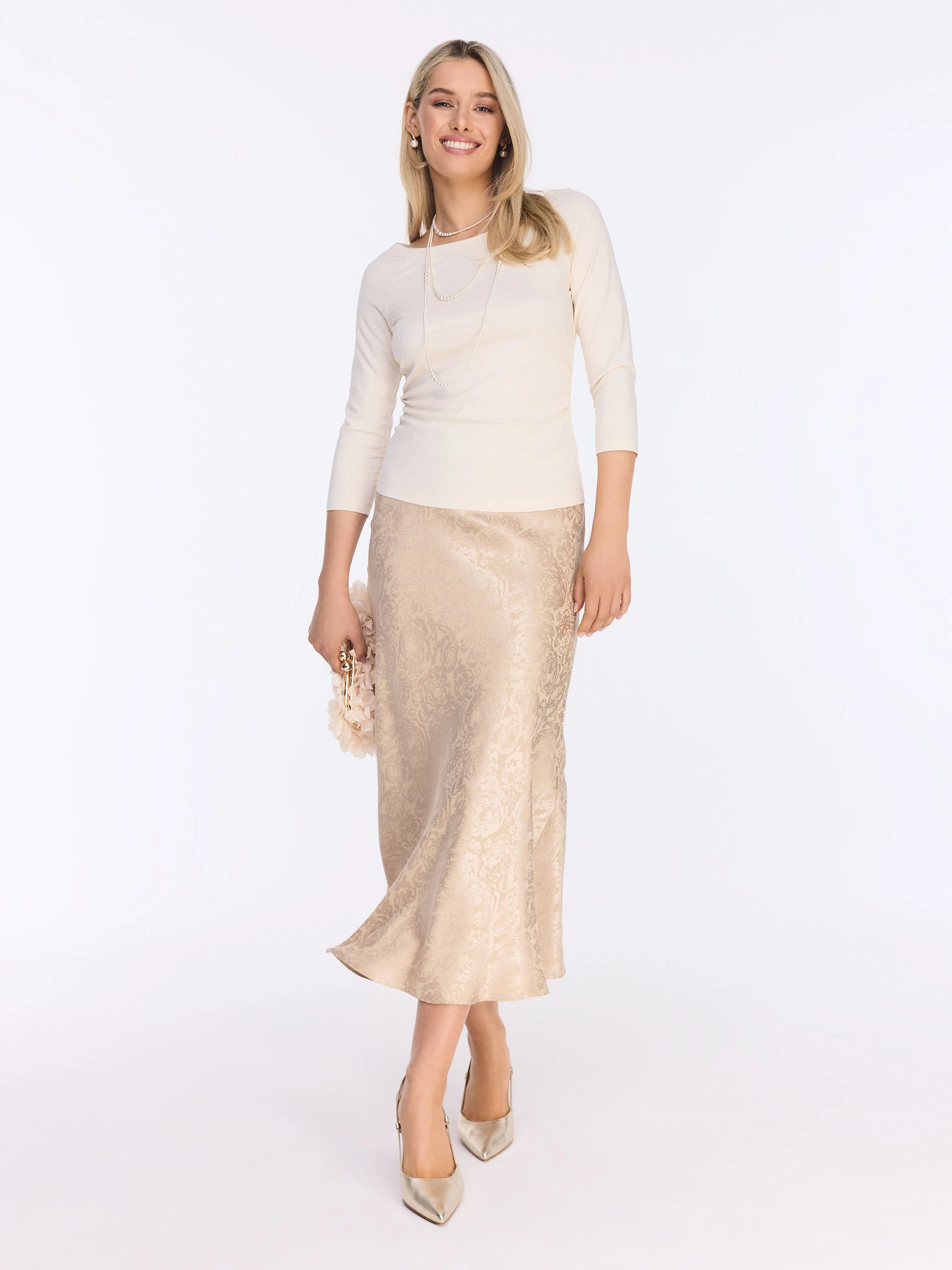 Cream blouse with ¾ sleeves