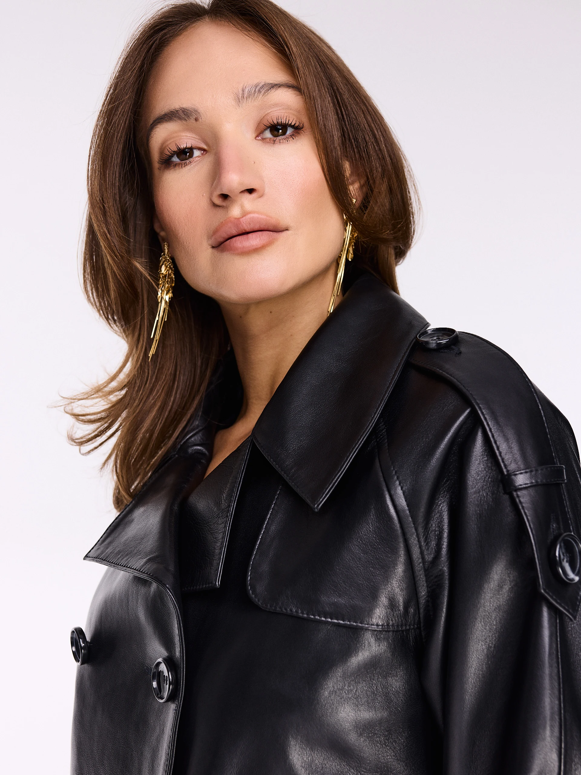 Black leather jacket with double-breasted fastening