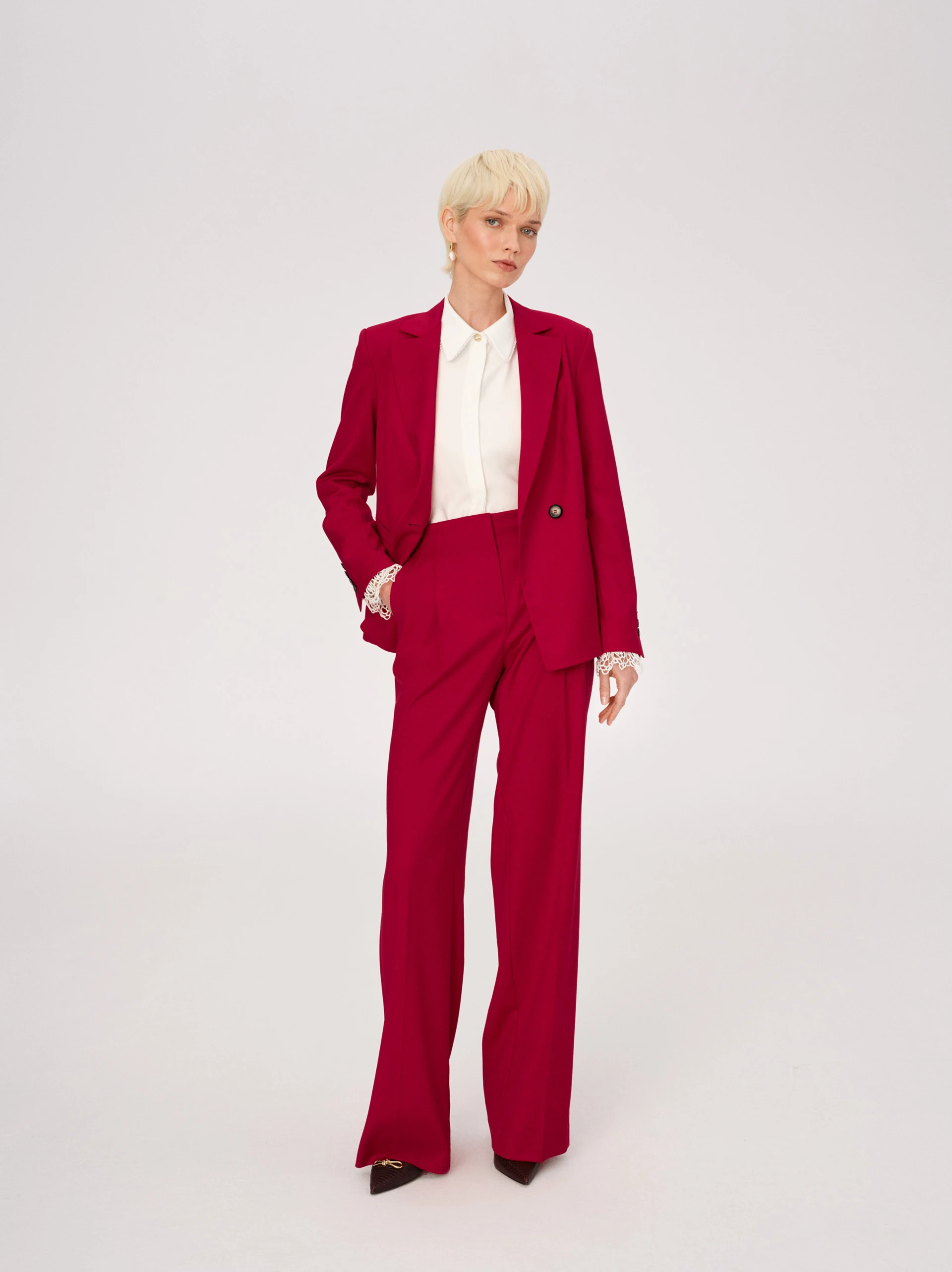 Red high-waisted suit pants
