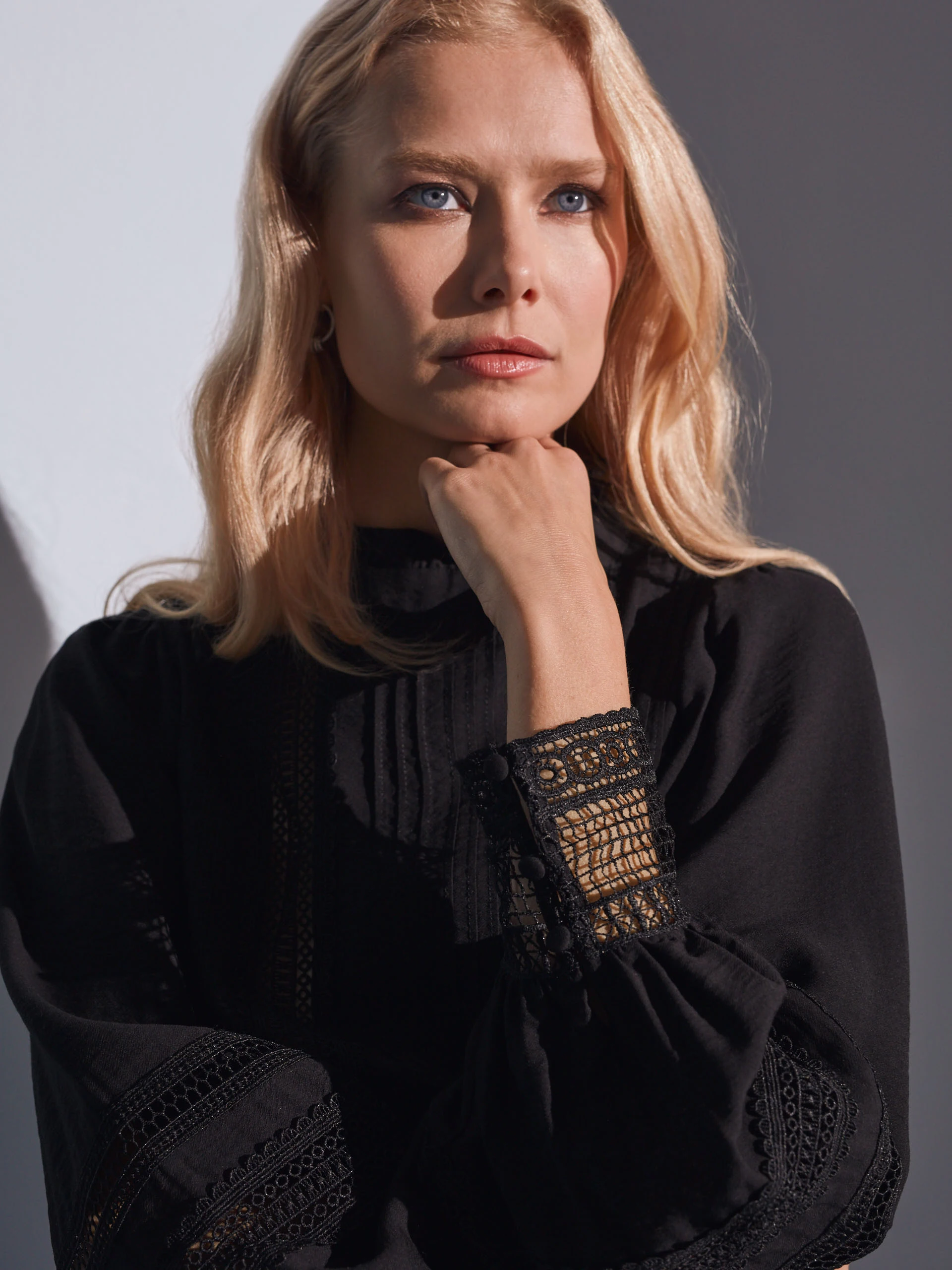 BLACK BLOUSE WITH LACE ELEMENTS