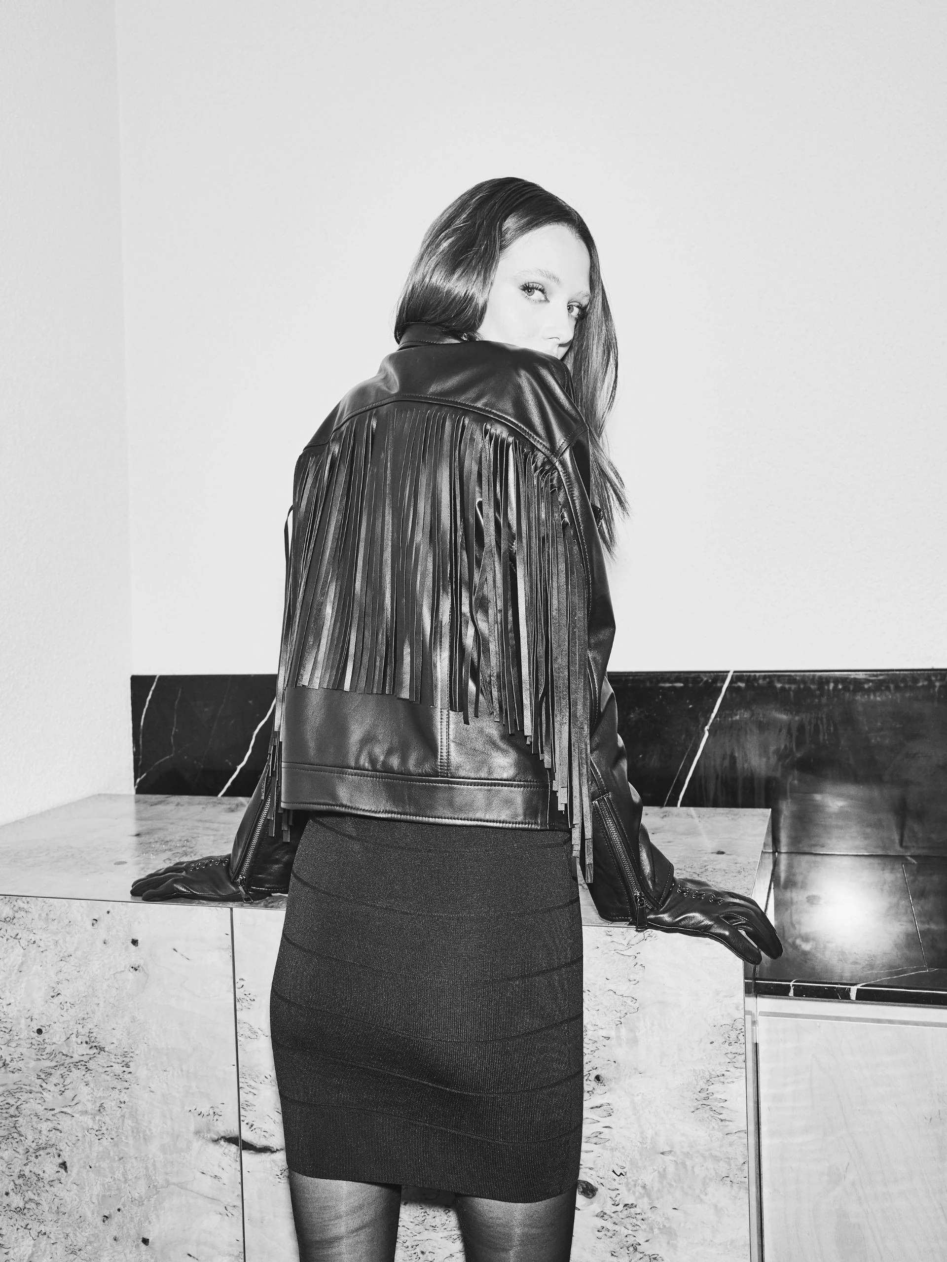 BLACK LEATHER RAMONESKI WITH TASSELS