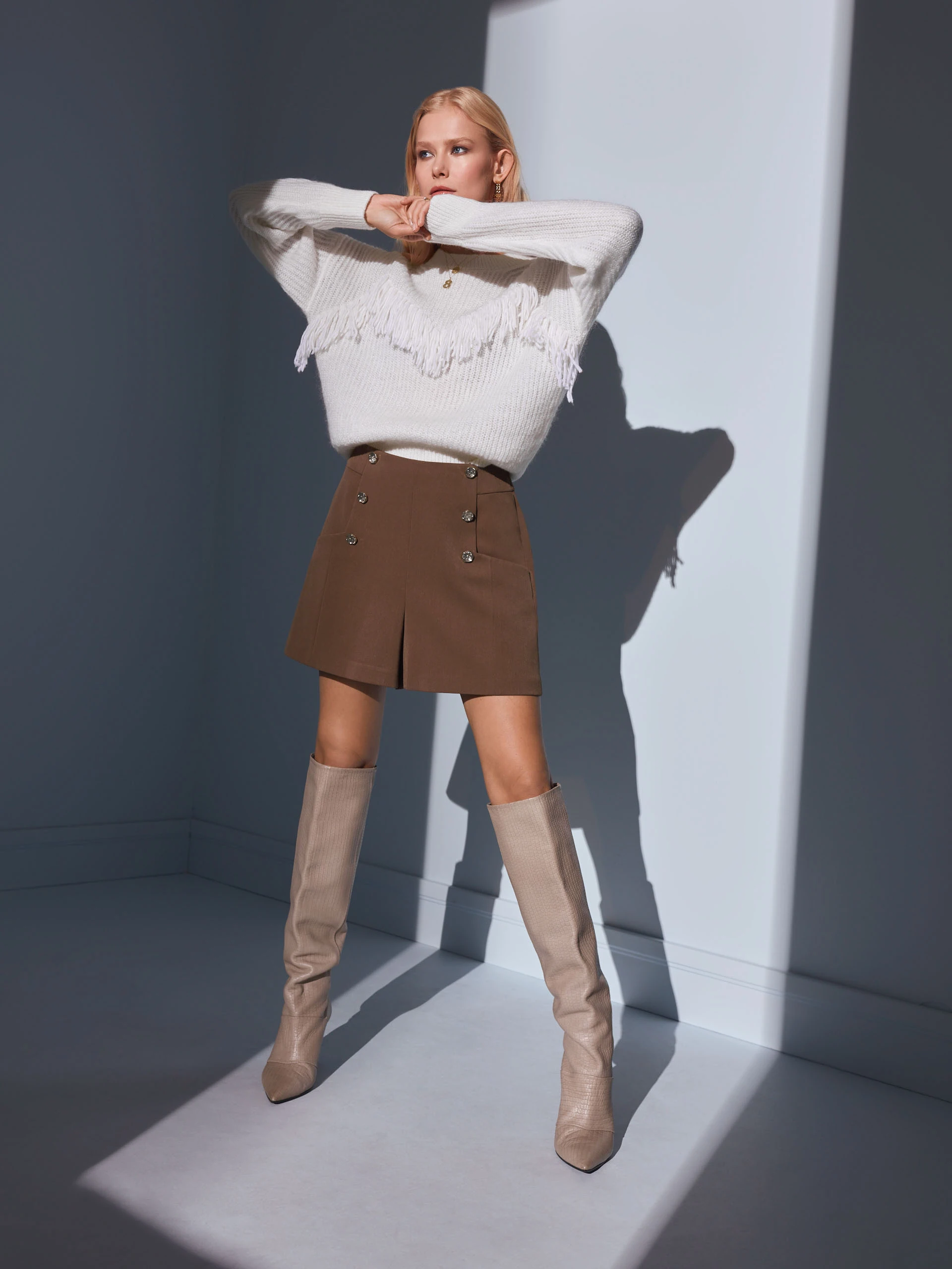 SWEATER WITH TASSELS