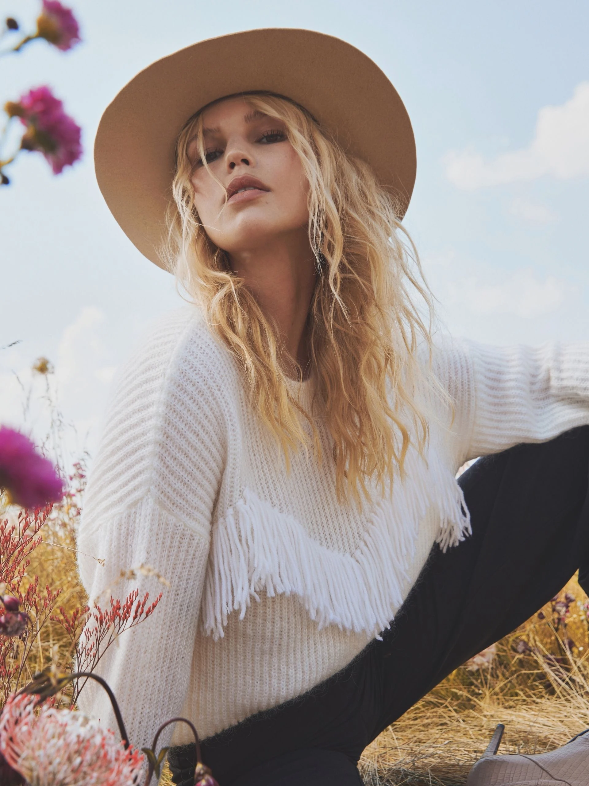 SWEATER WITH TASSELS