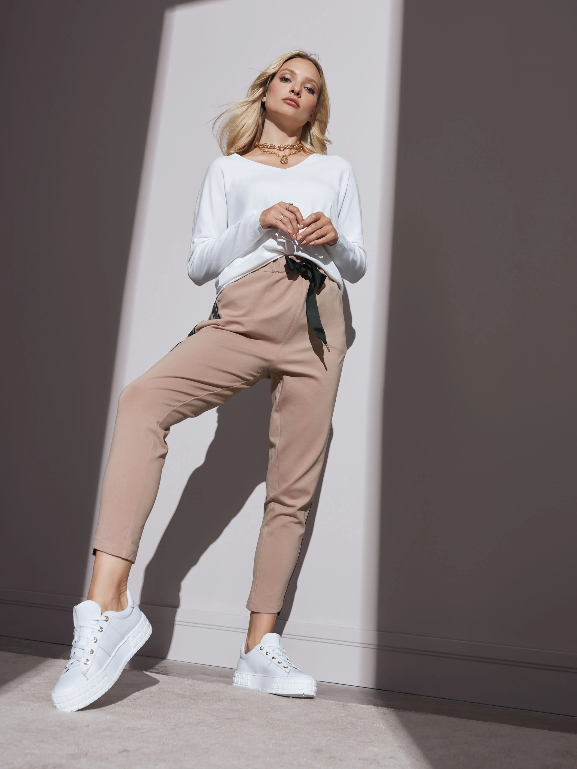 White sweater with a sweetheart neckline