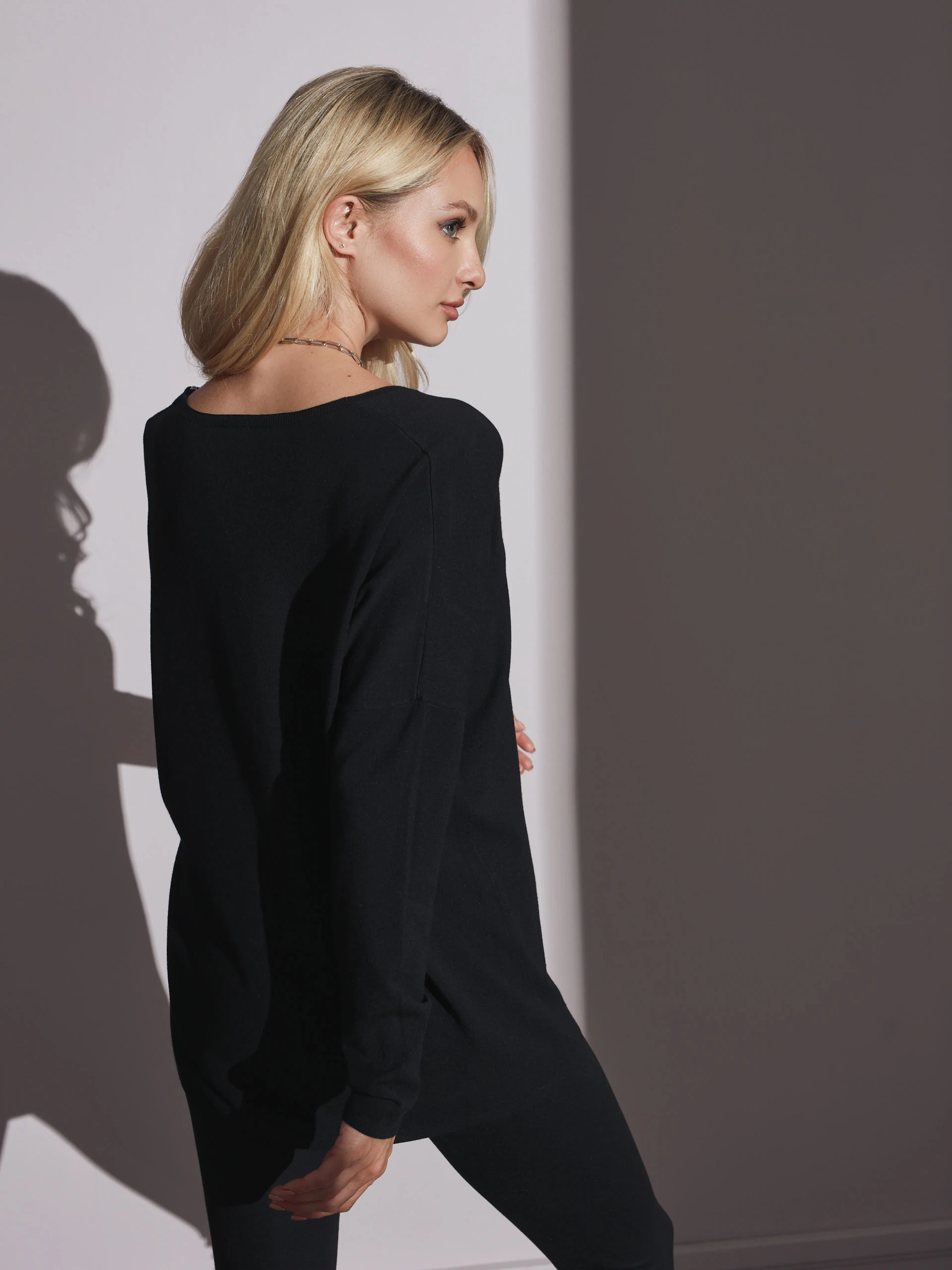Black sweater with heart neckline