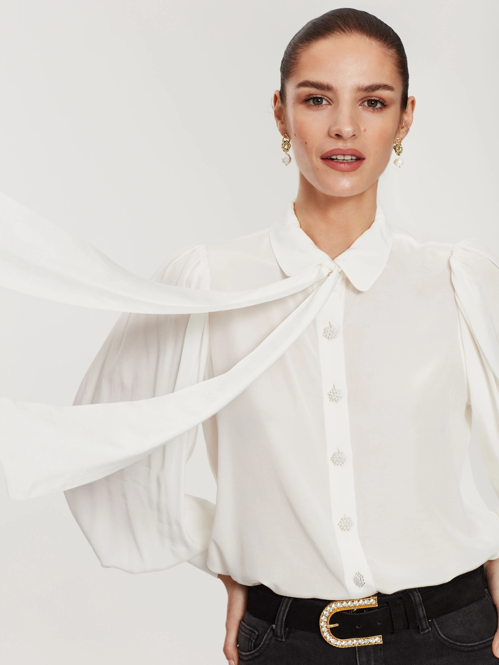White tie-neck shirt
