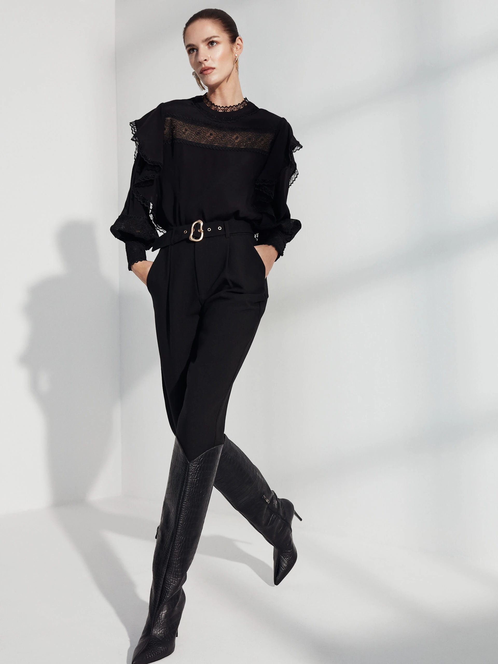 Black blouse with lace inserts