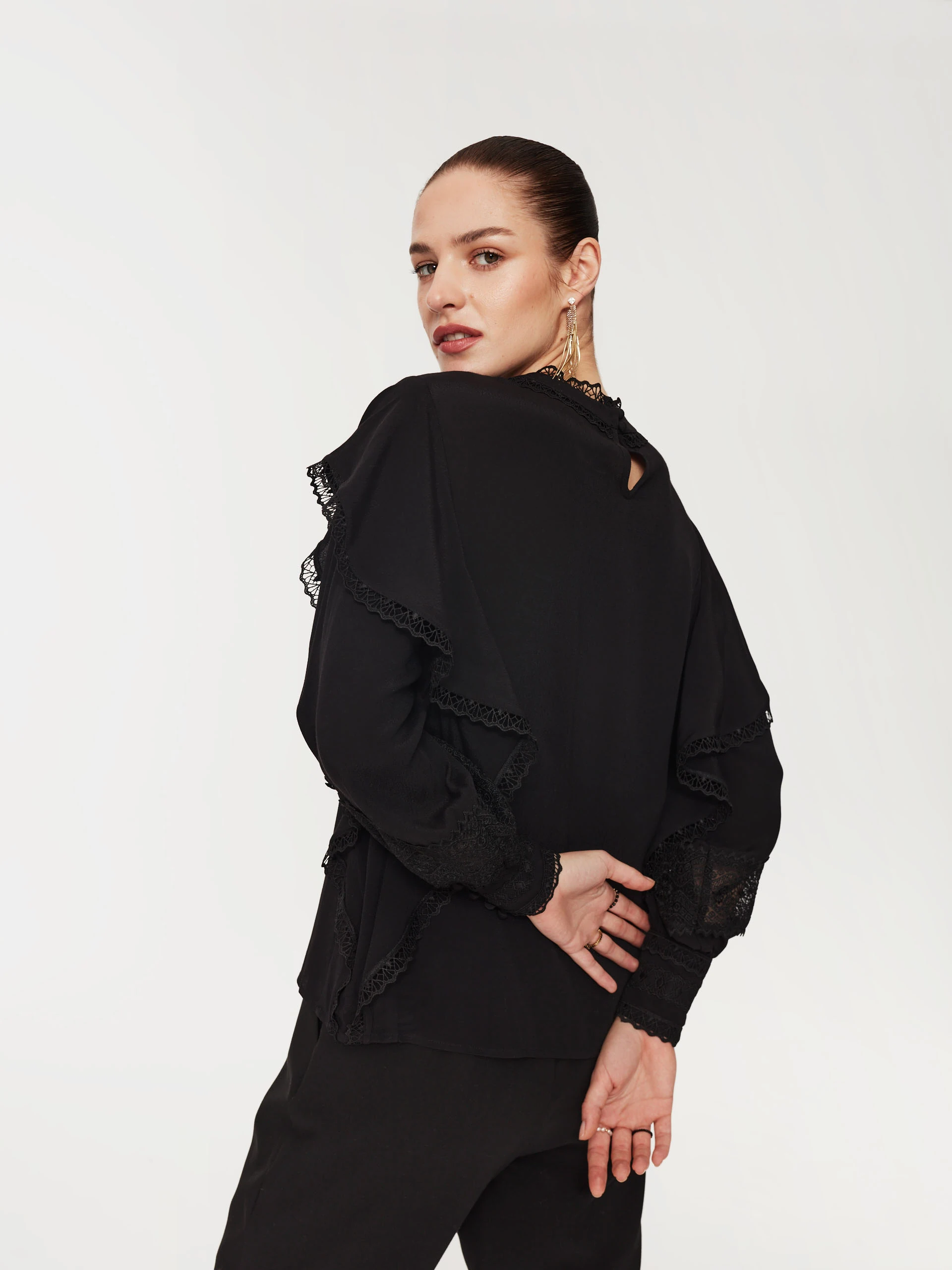 Black blouse with lace inserts