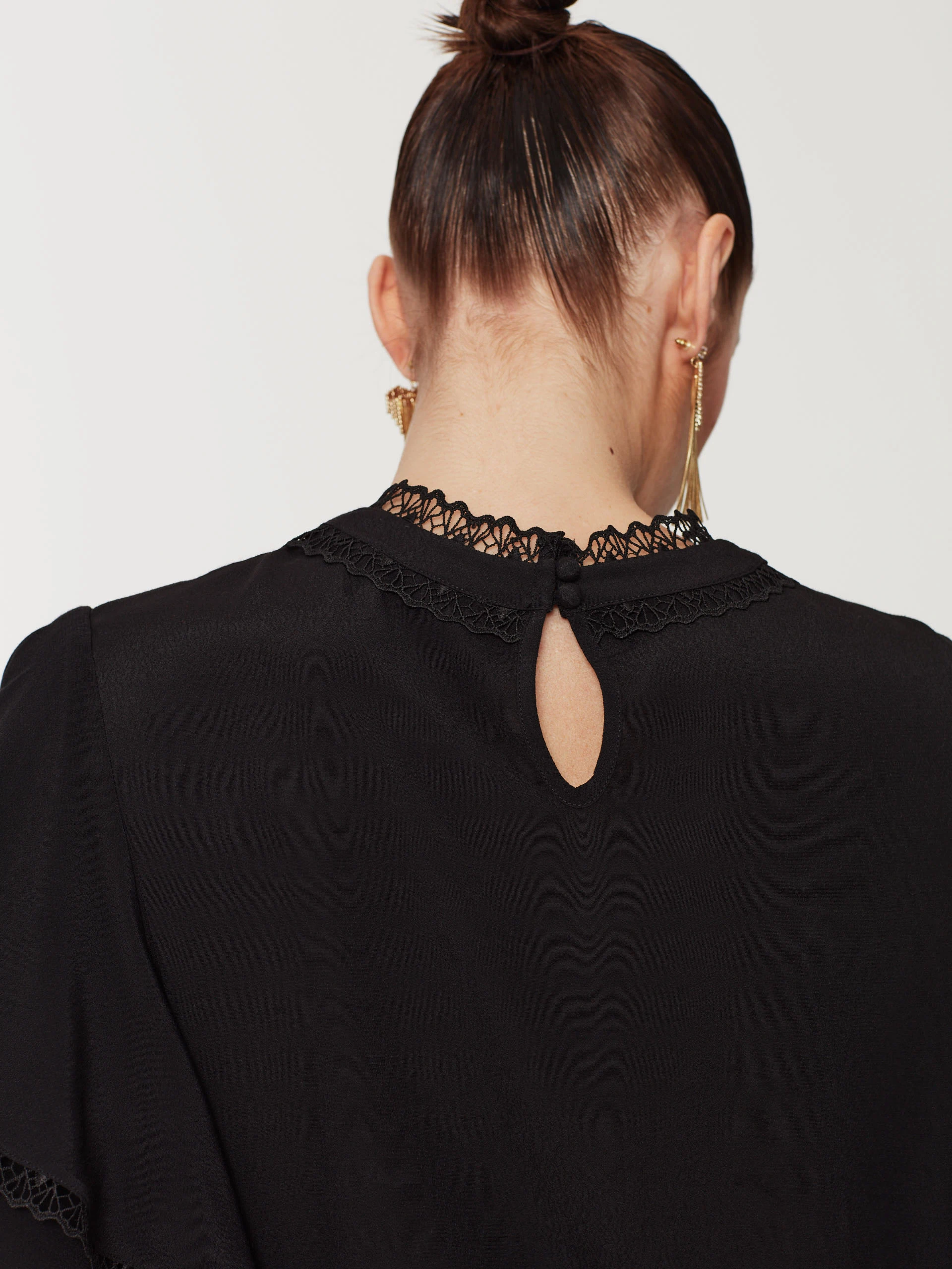 Black blouse with lace inserts