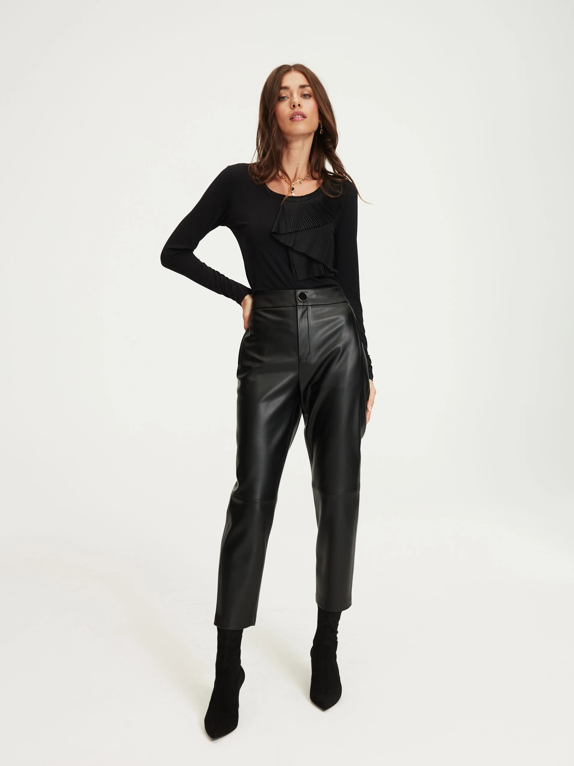 Black faux leather pants