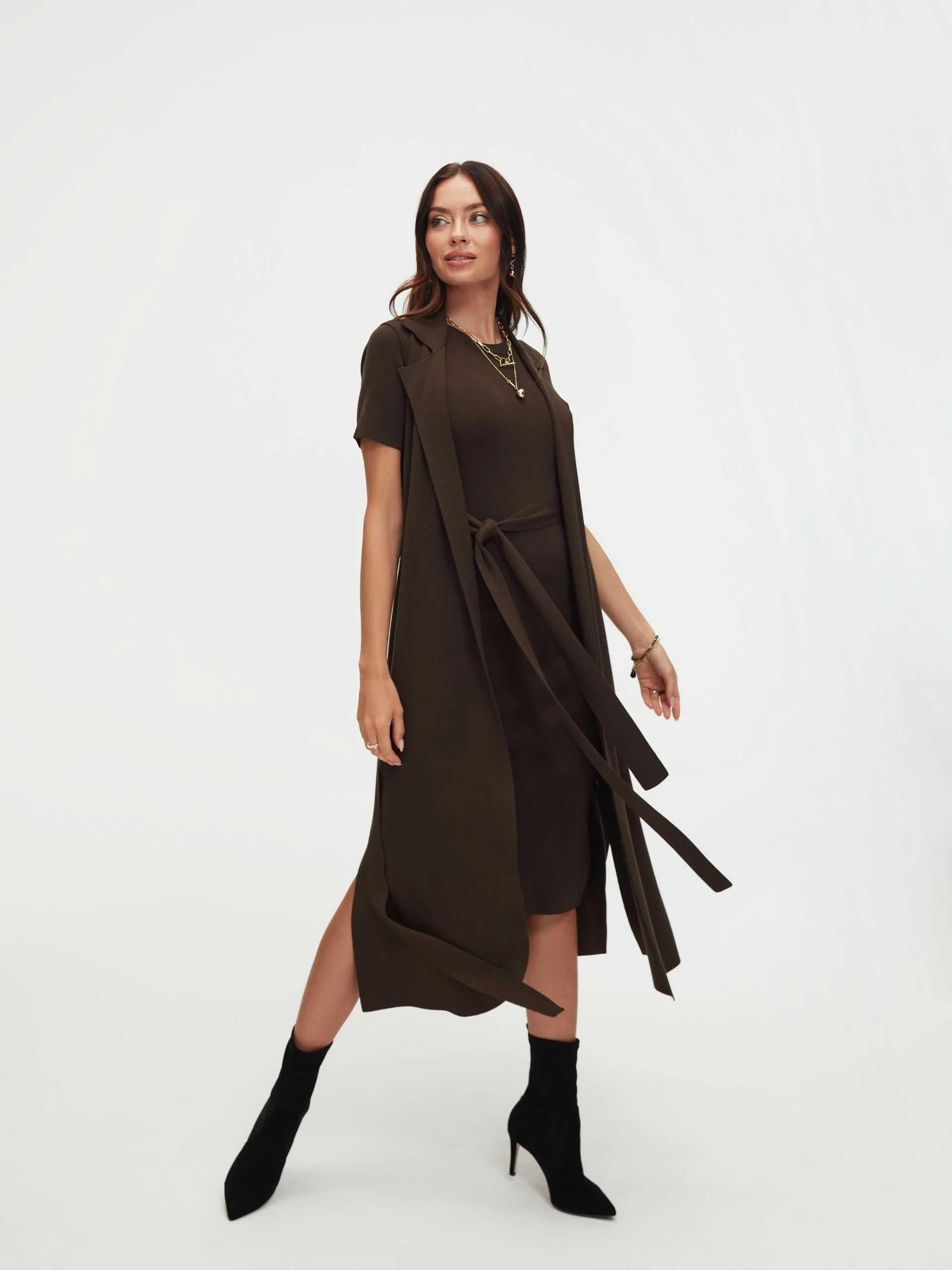 Long brown sleeveless sweater