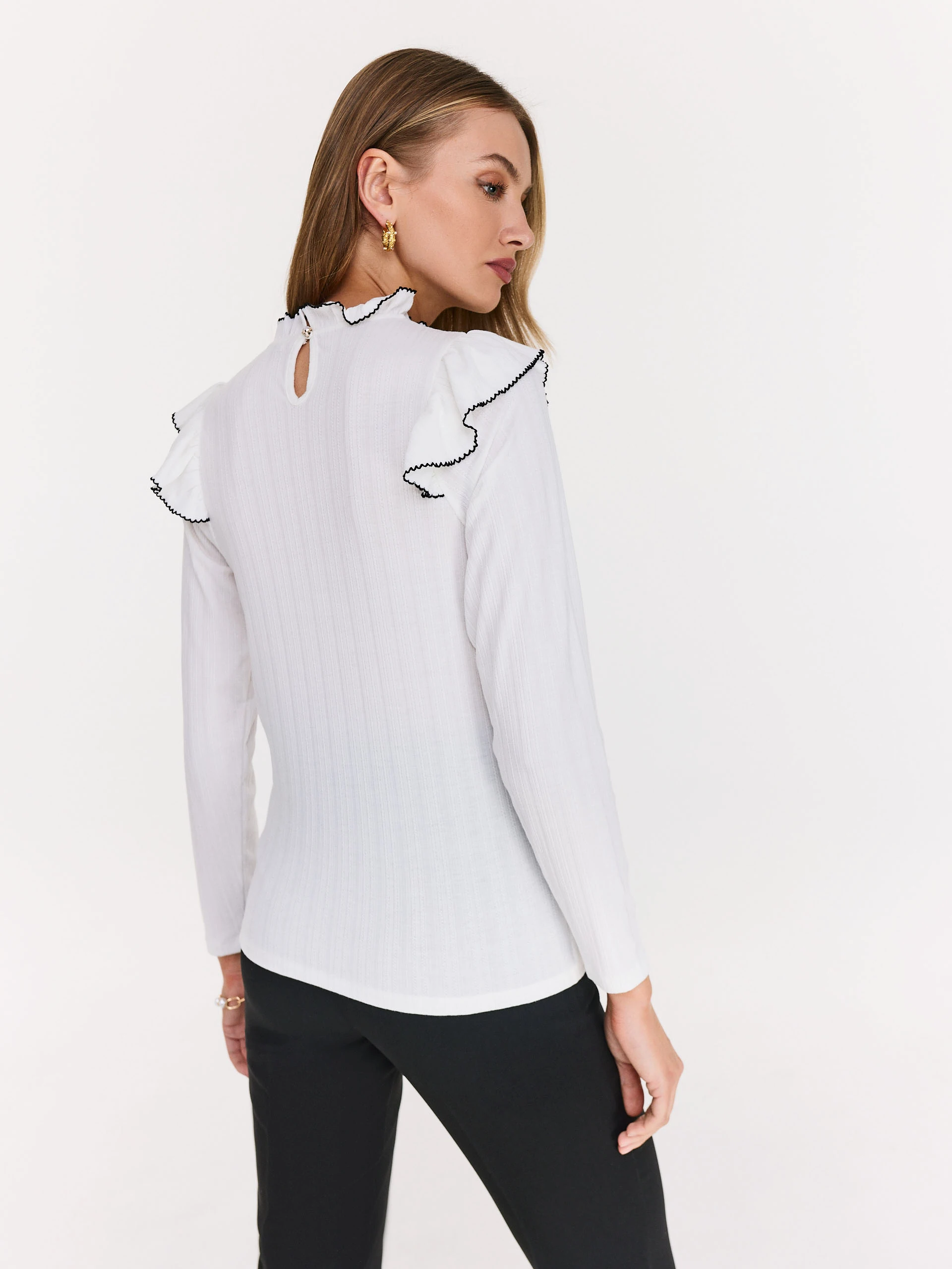 White blouse with stand-up collar and ruffles