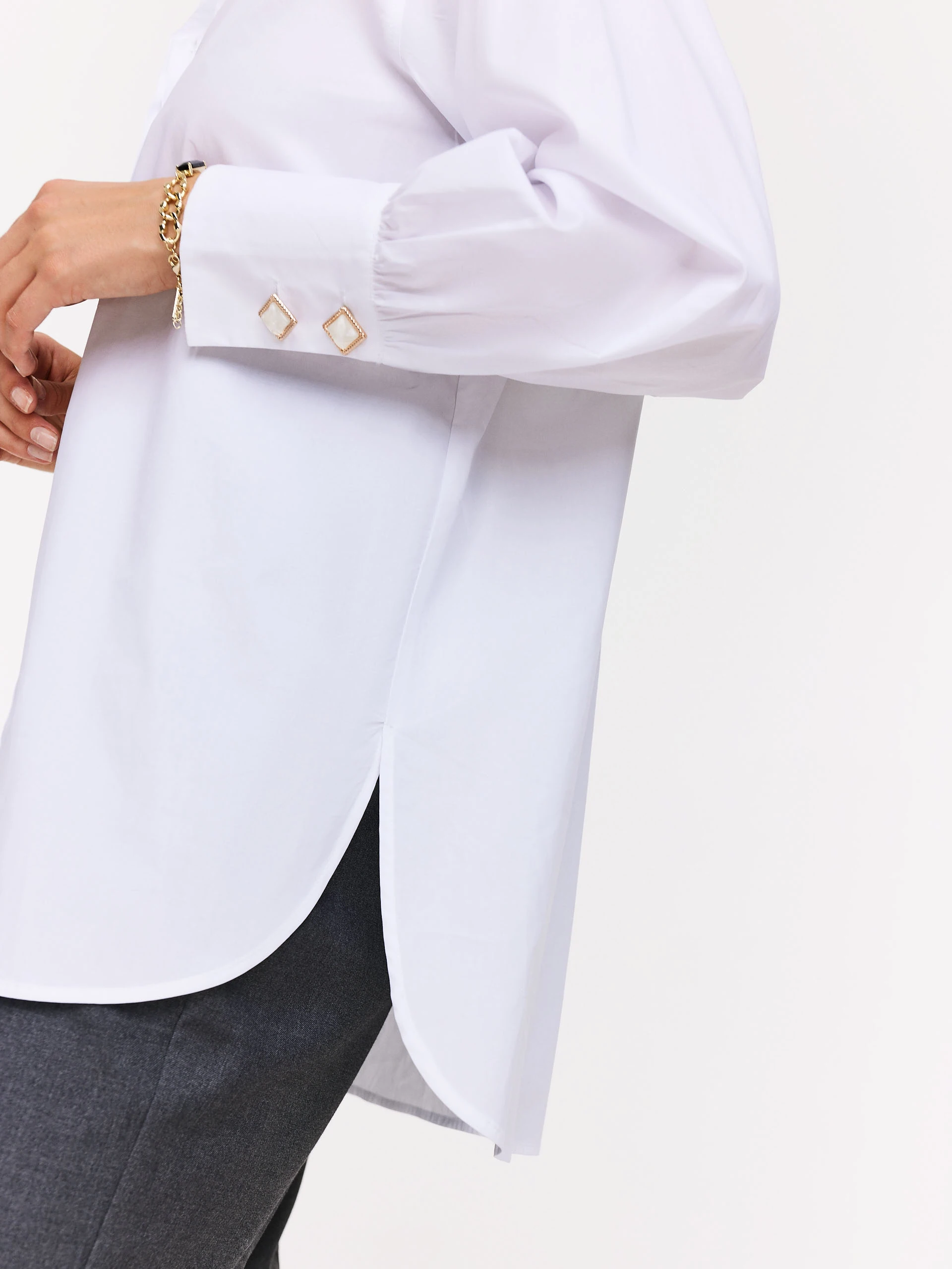 White shirt with decorative buttons