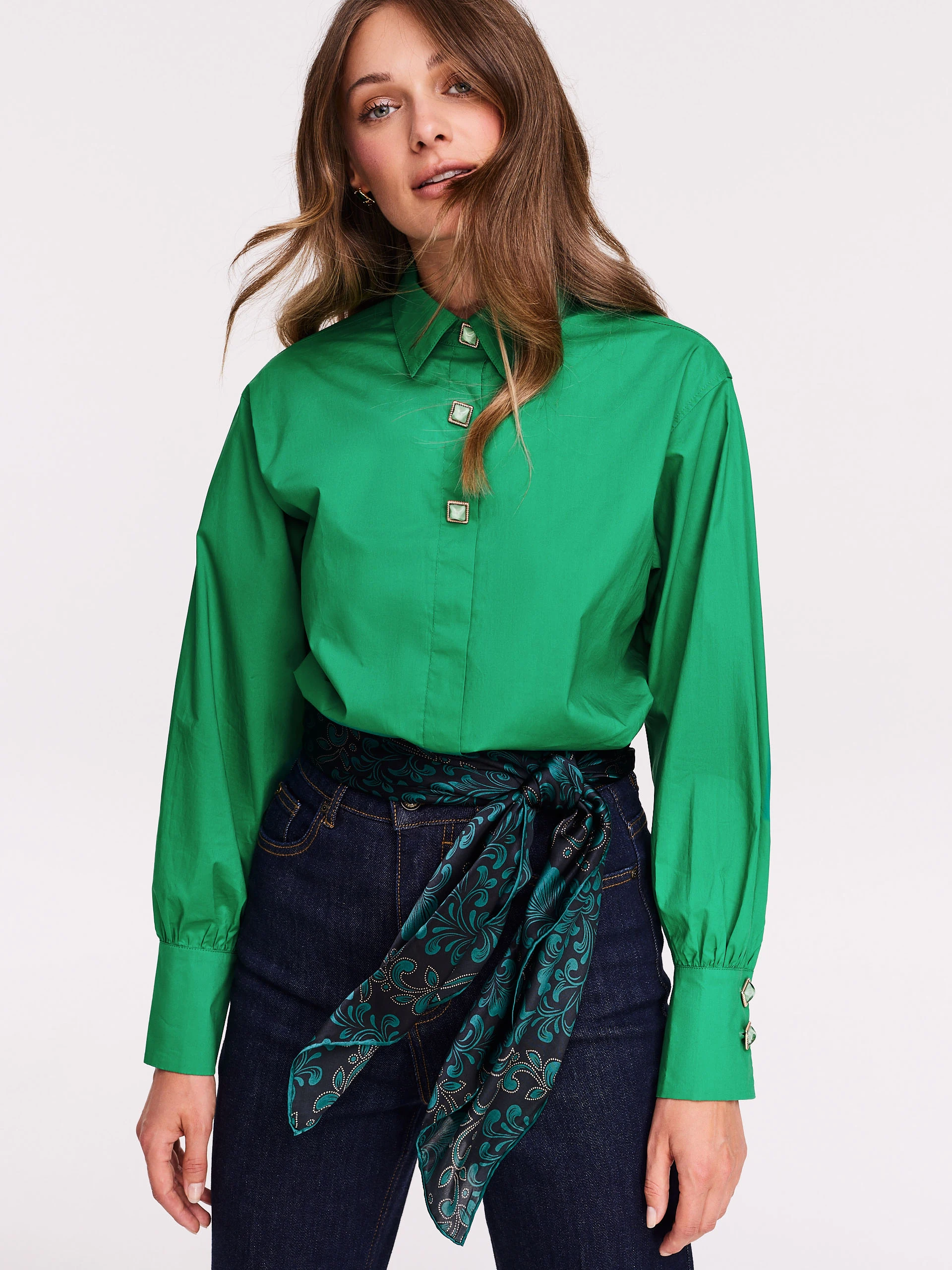 Satin green shirt with decorative buttons