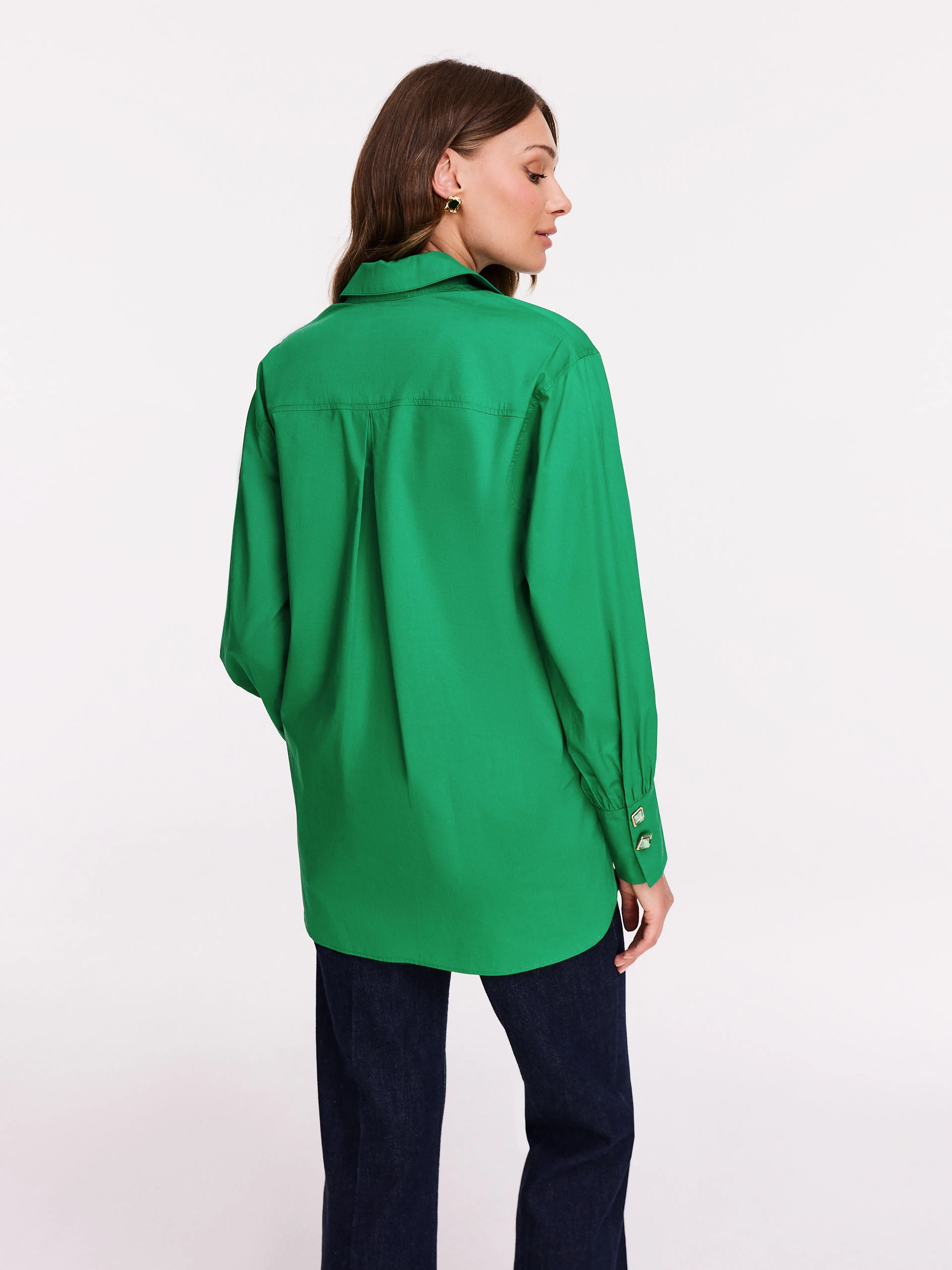 Satin green shirt with decorative buttons