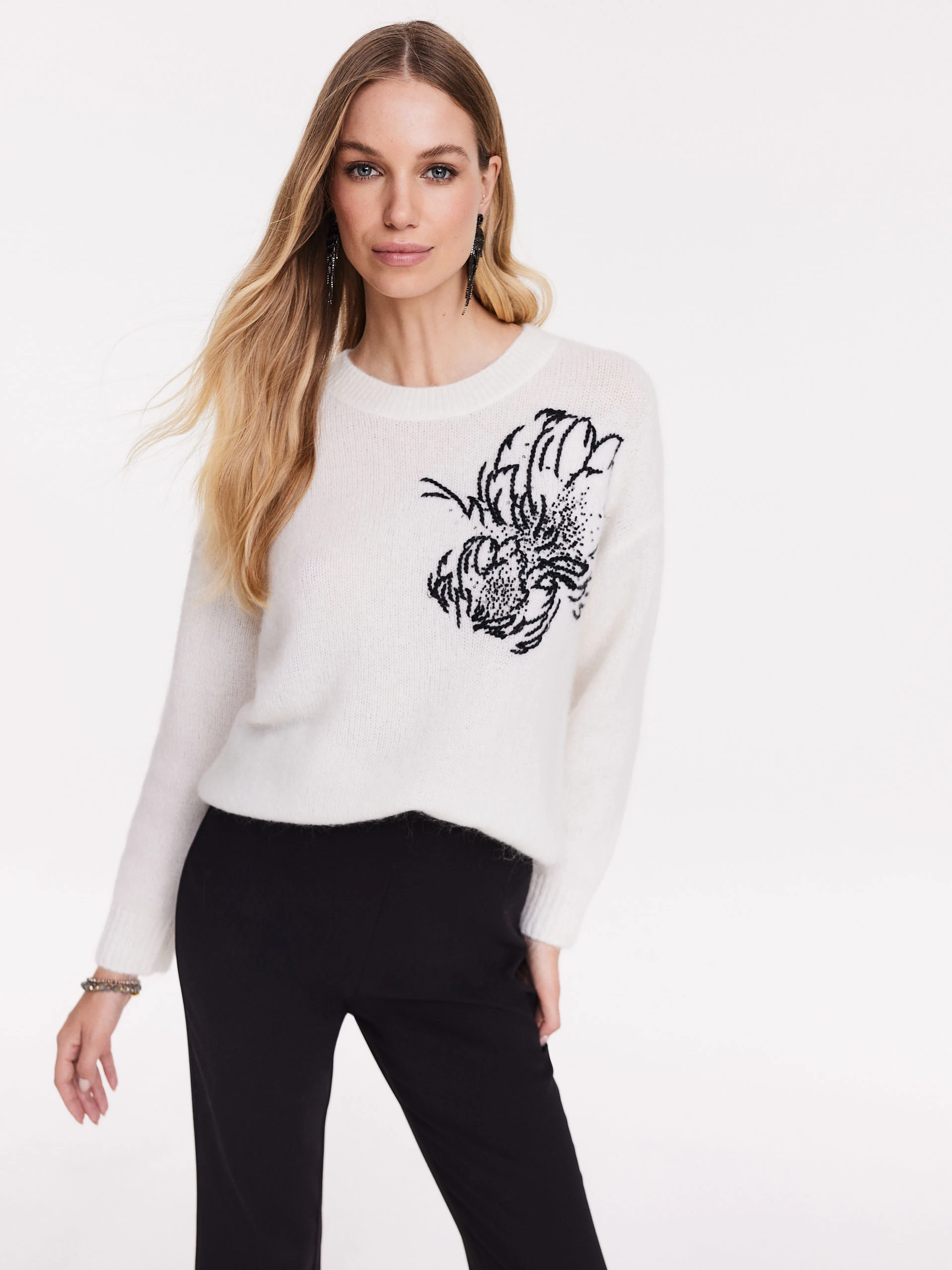 White sweater with applique