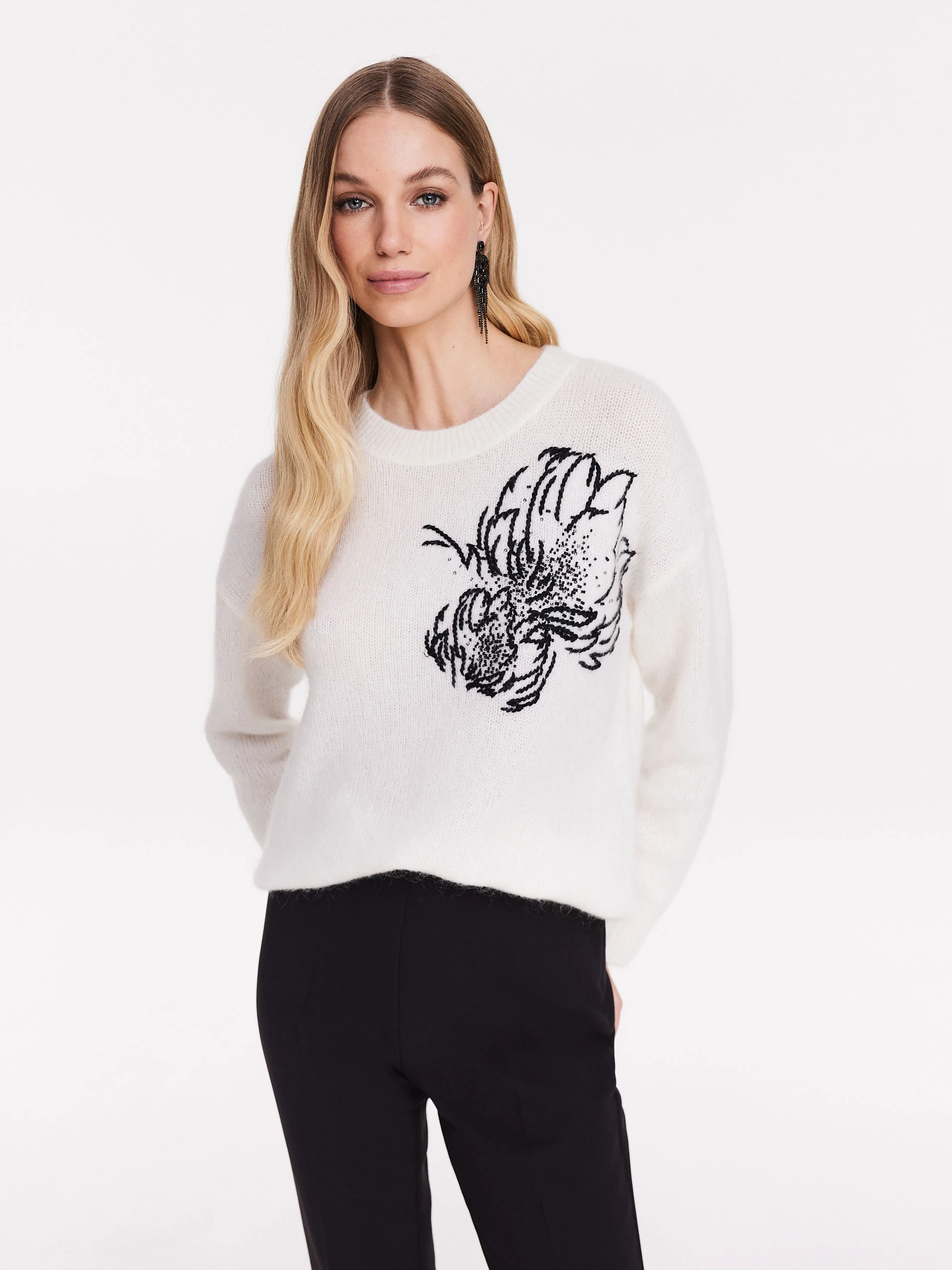 White sweater with applique