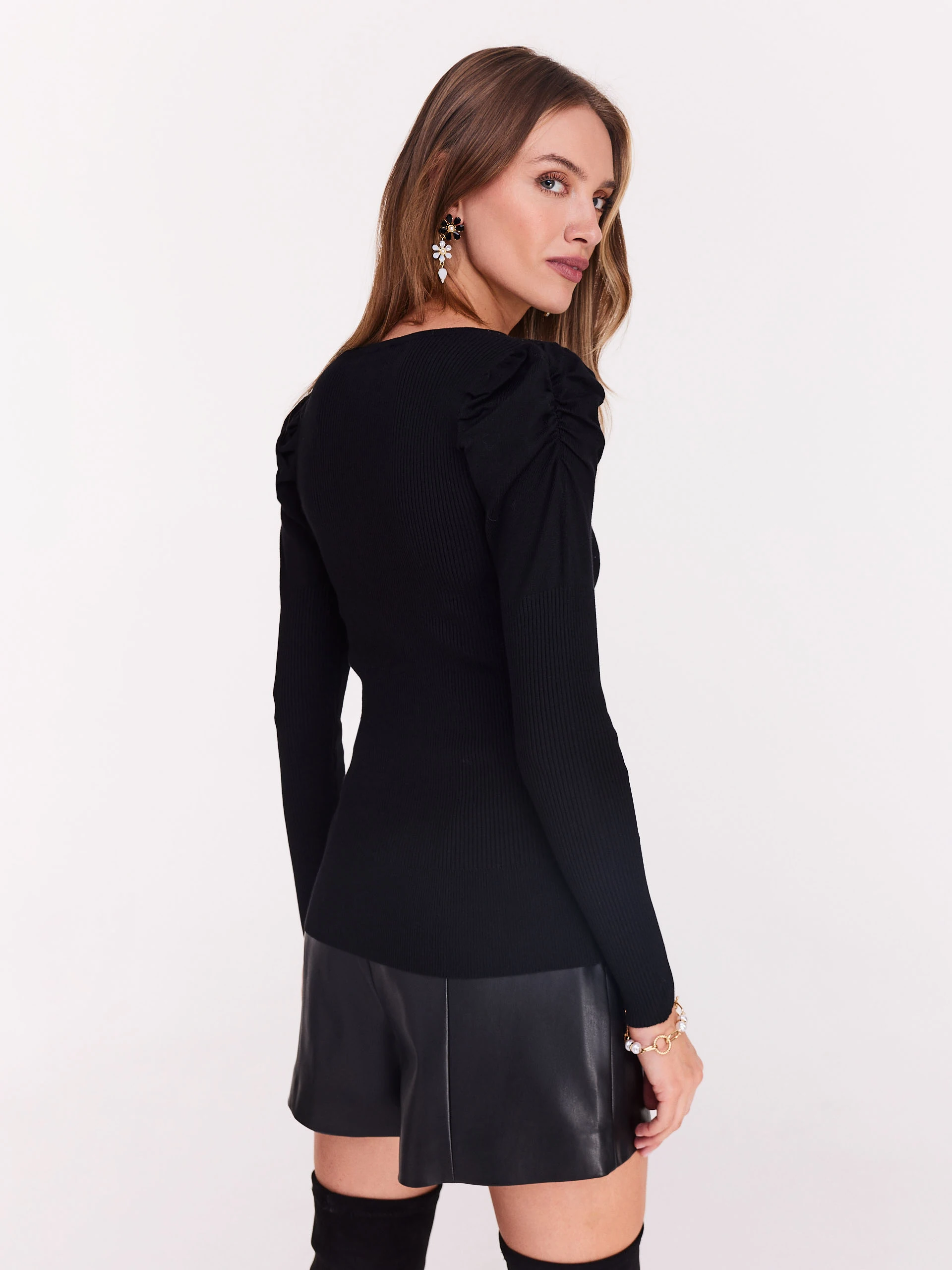 Black sweater with buffets and beads