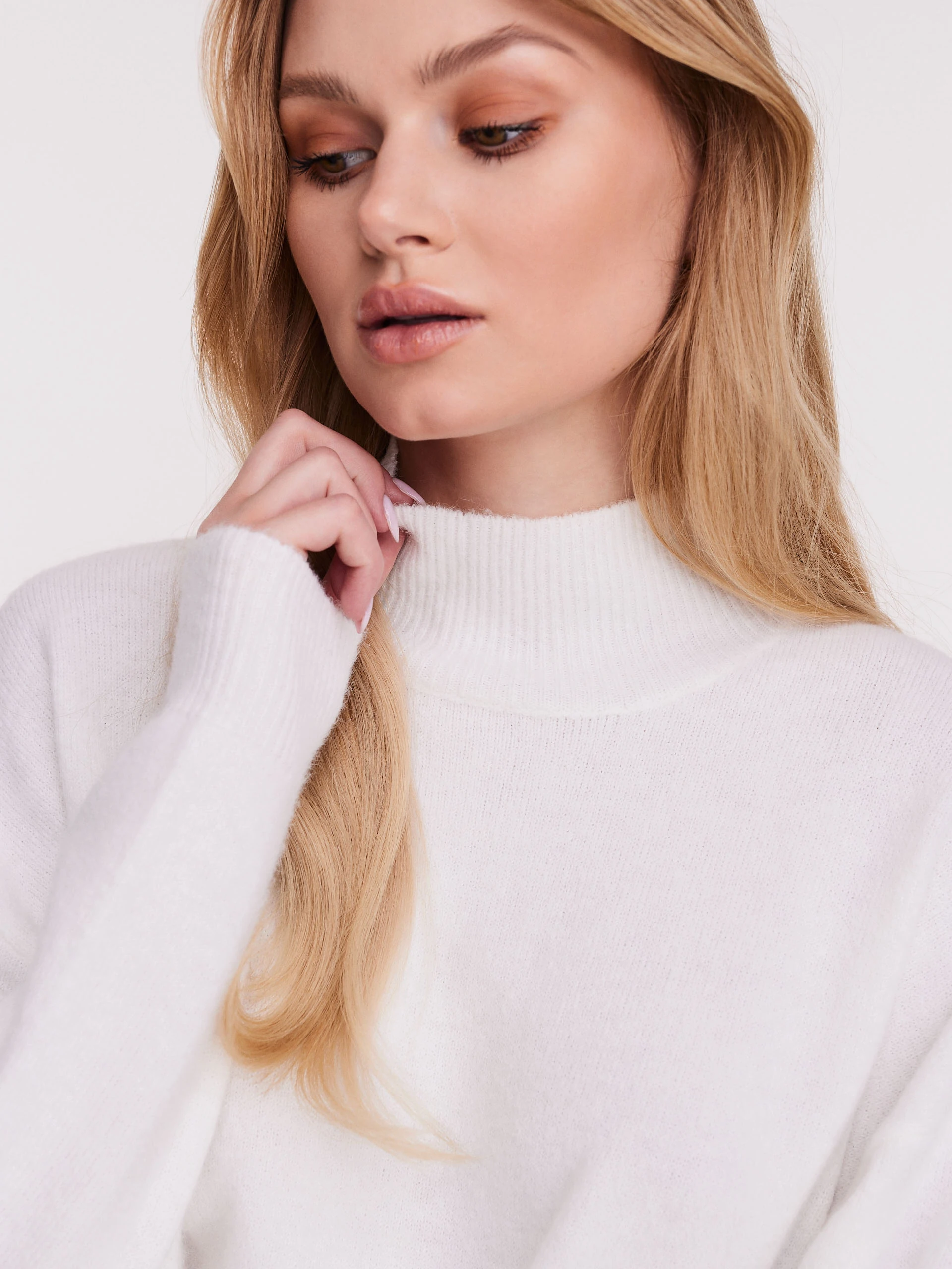 Loose white turtleneck with wool blend