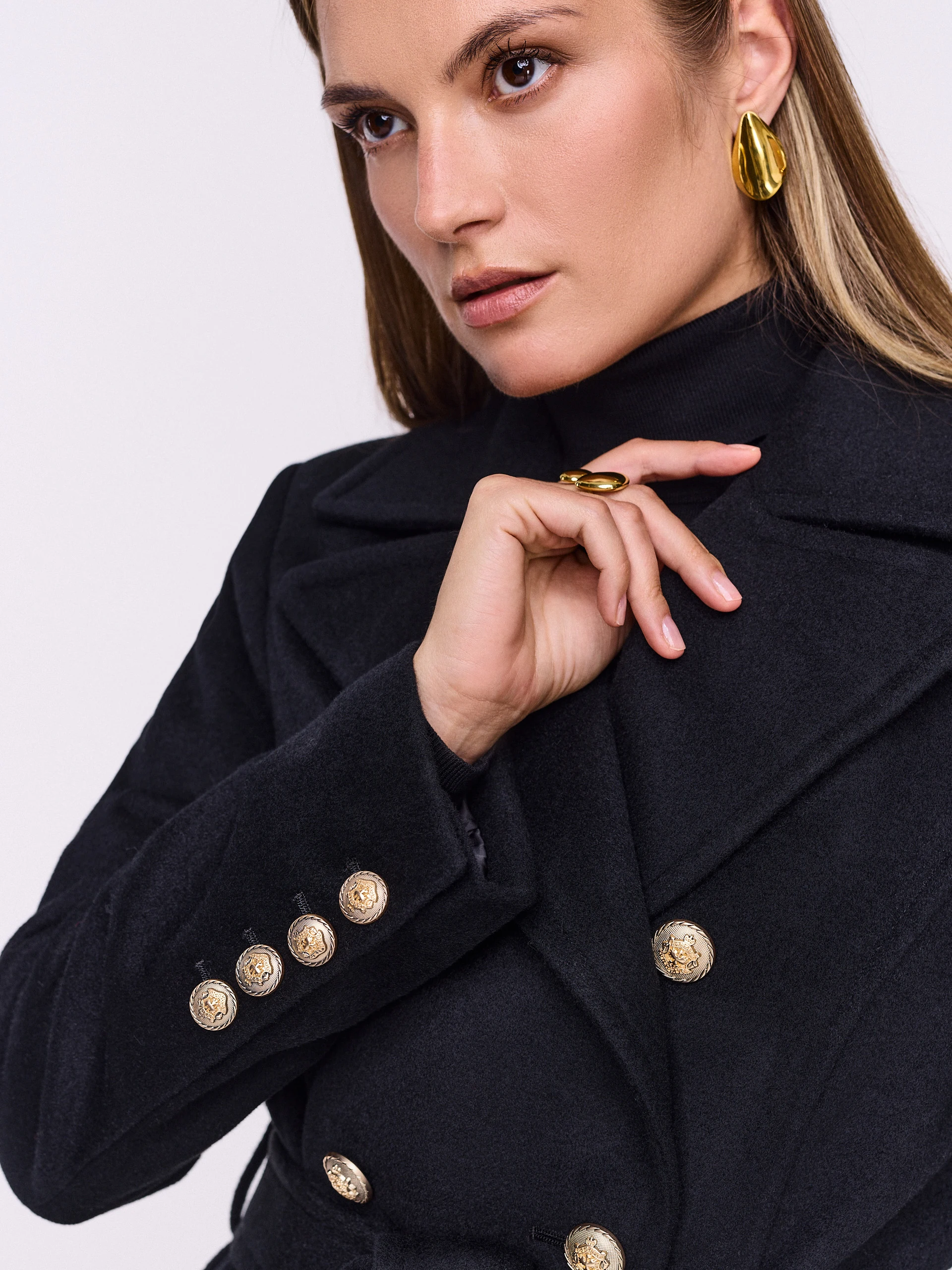 Black double-breasted wool coat