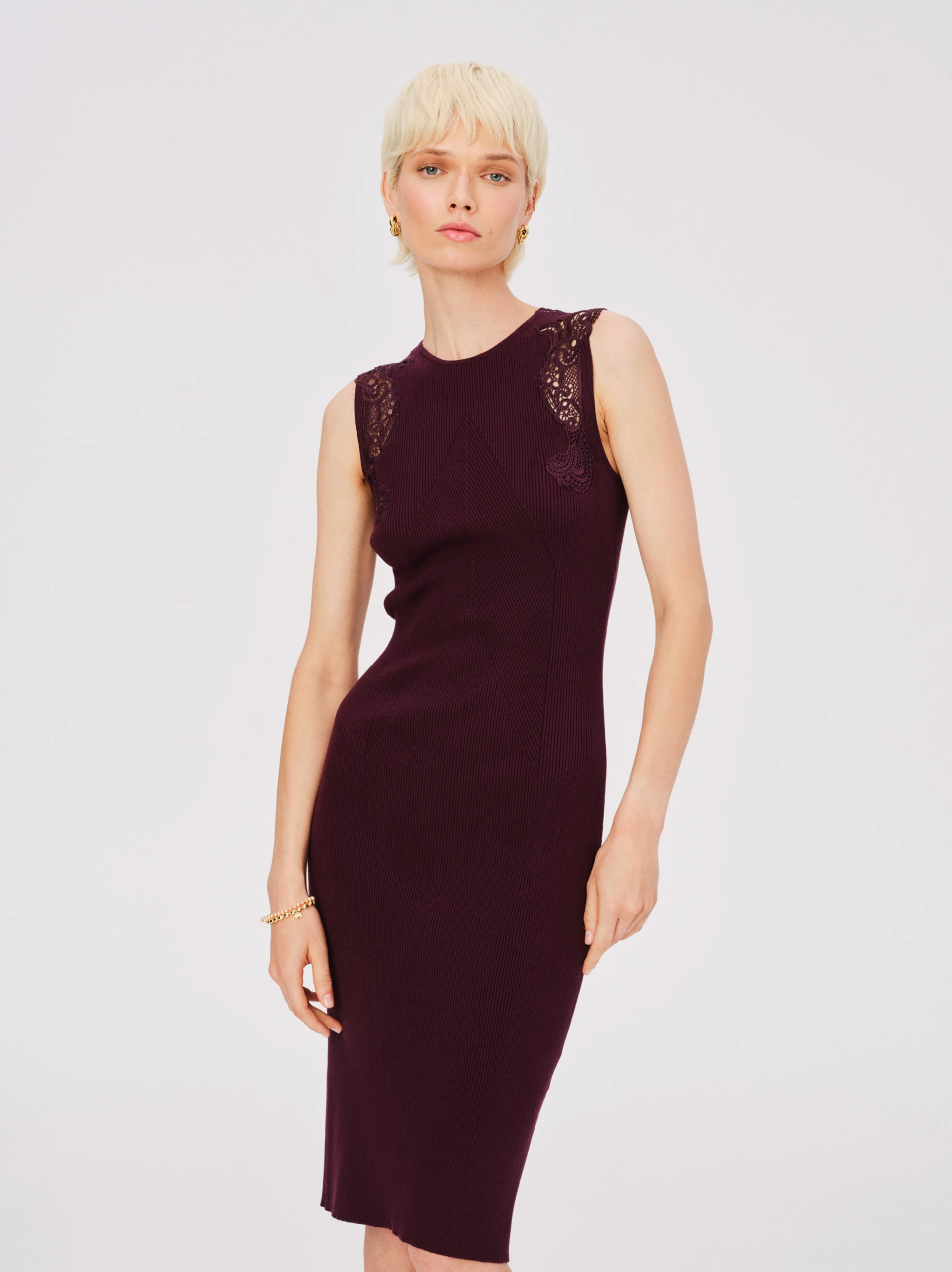 Fitted burgundy dress with openwork inserts