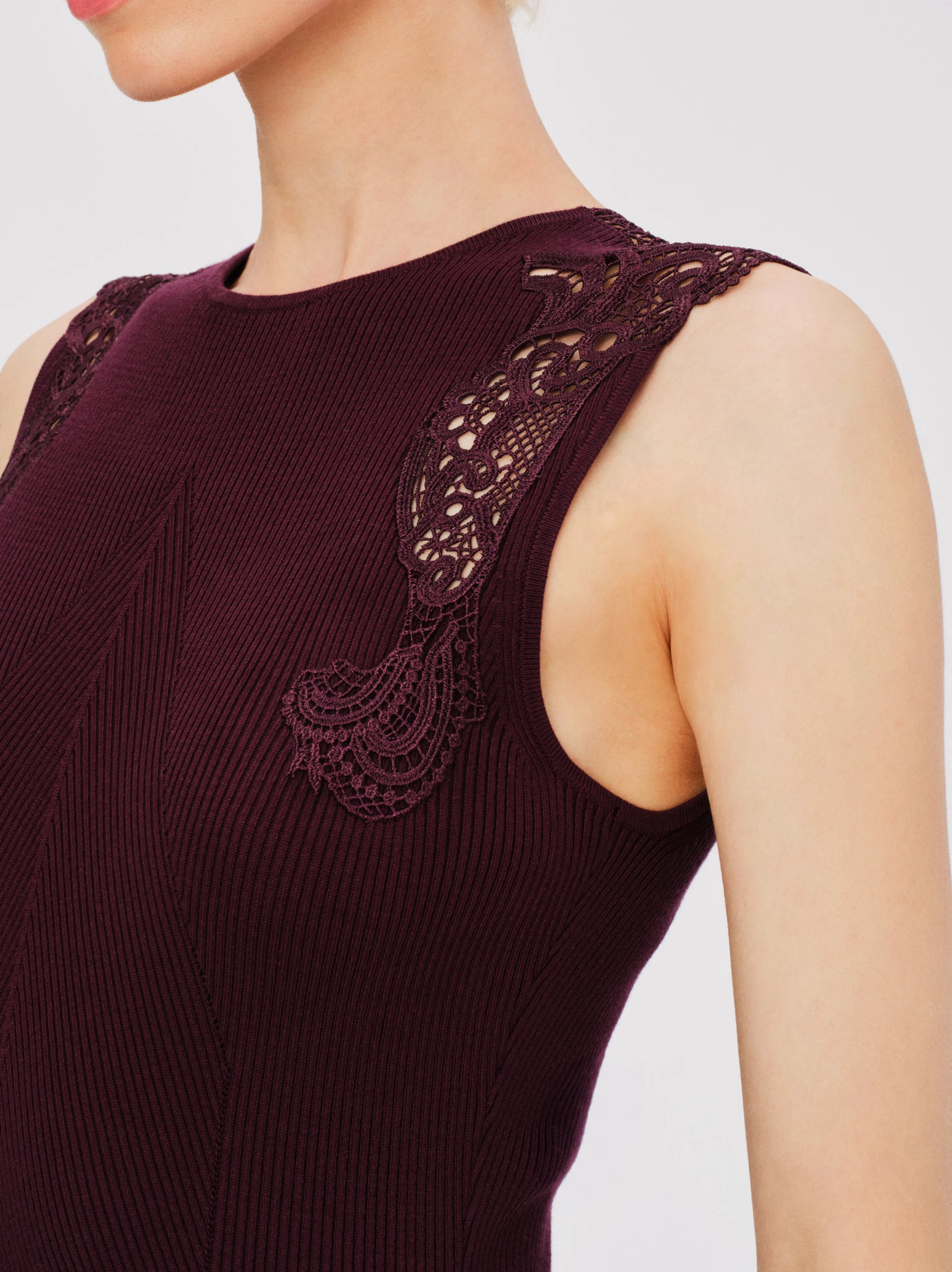 Fitted burgundy dress with openwork inserts