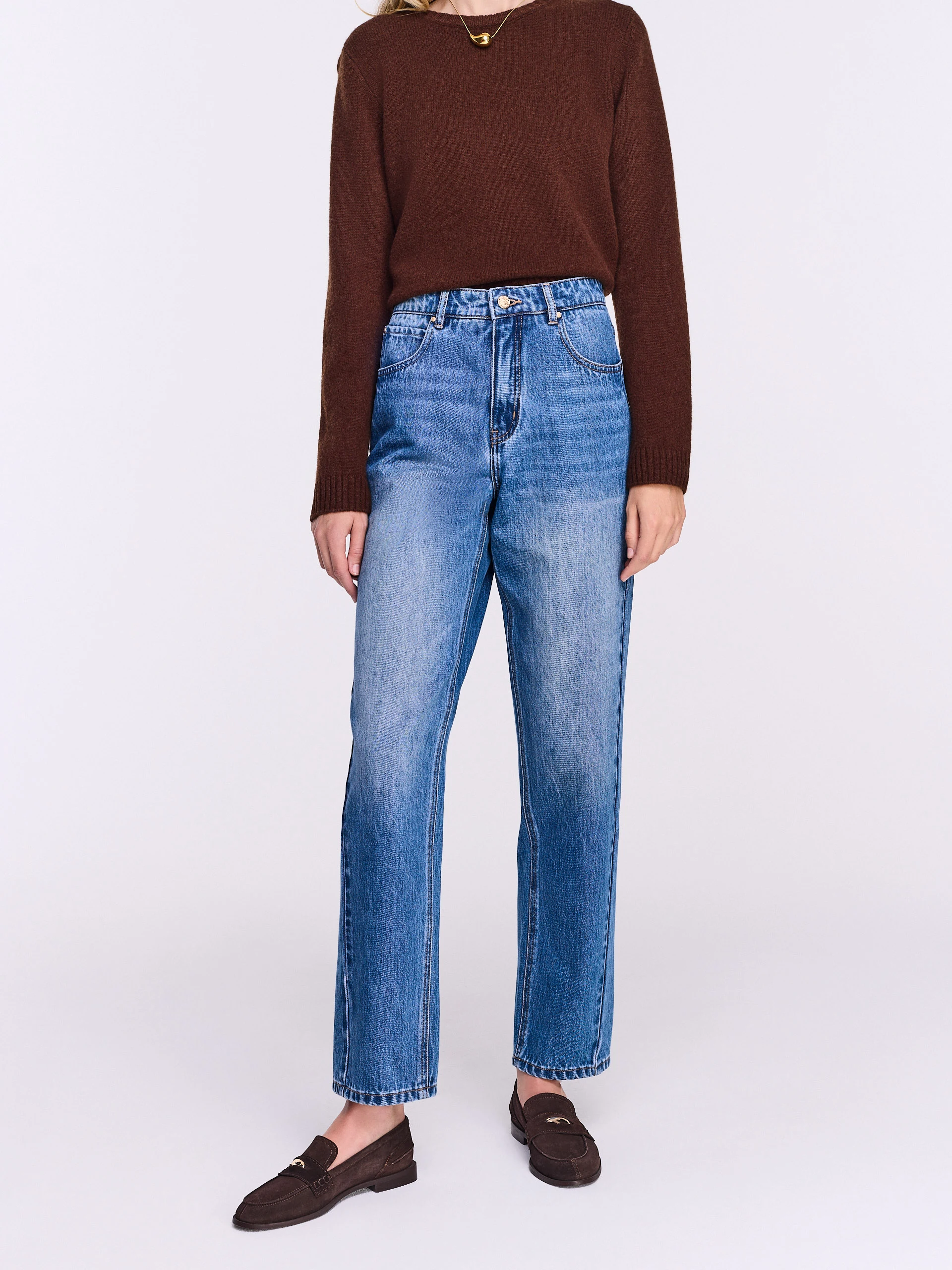 Blue distressed jeans with stitching