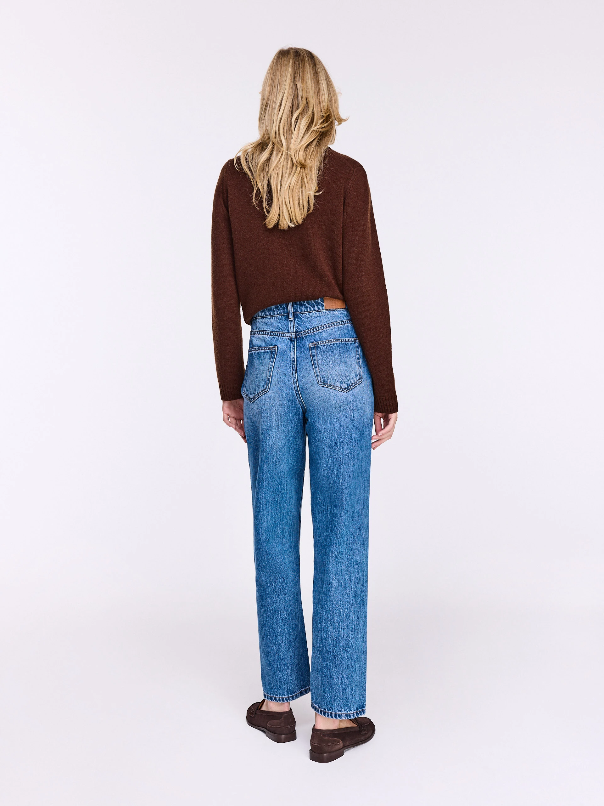 Blue distressed jeans with stitching