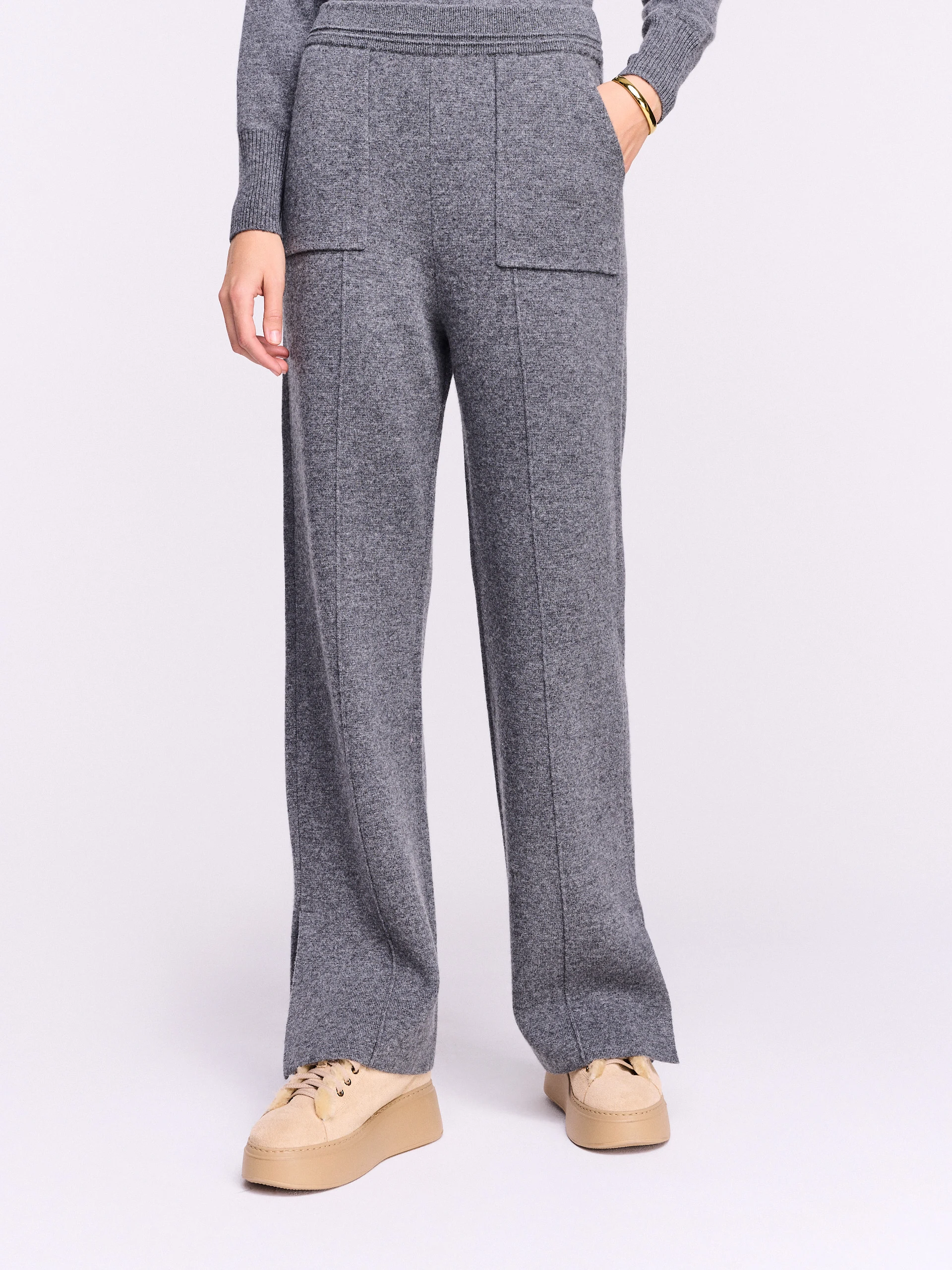 Gray knit pants with a high waist