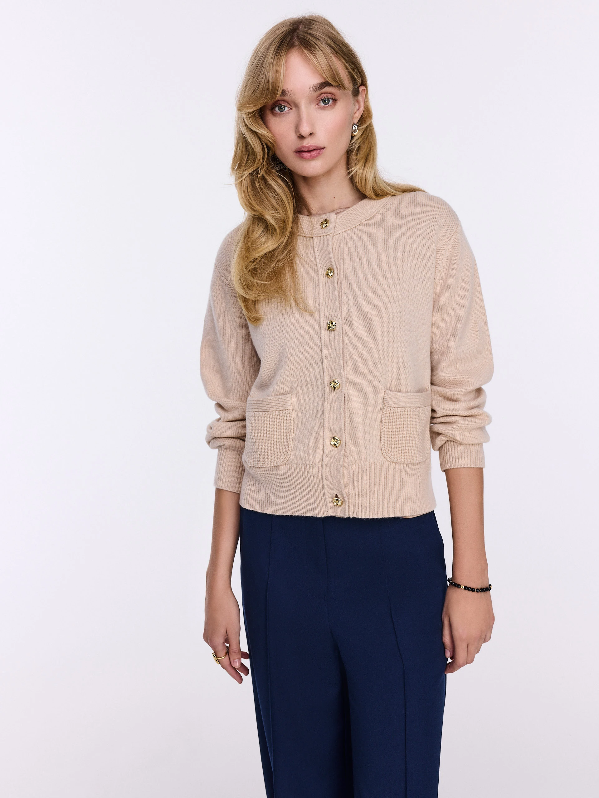 Beige cardigan with gold buttons and cashmere accents