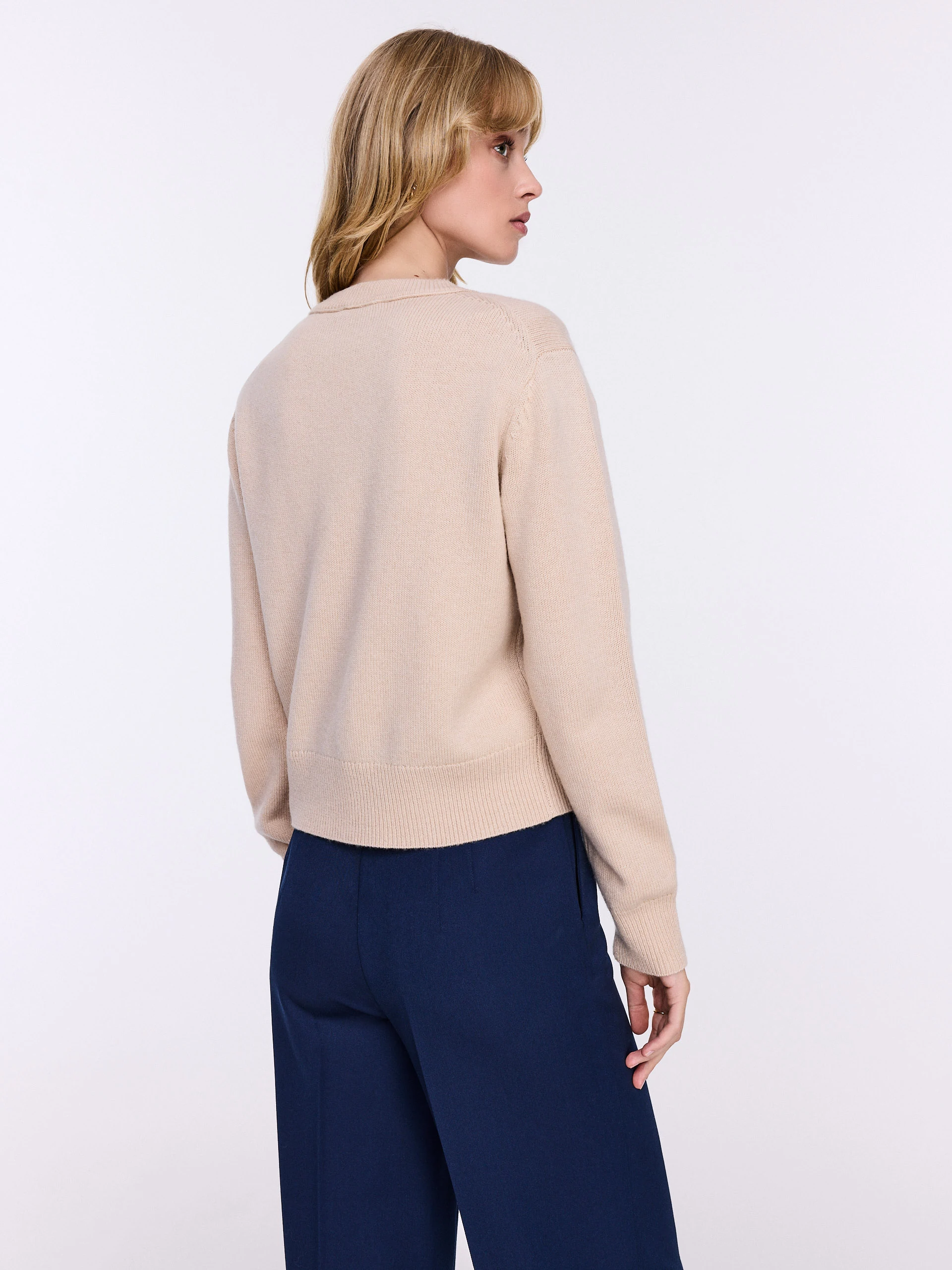 Beige cardigan with gold buttons and cashmere accents