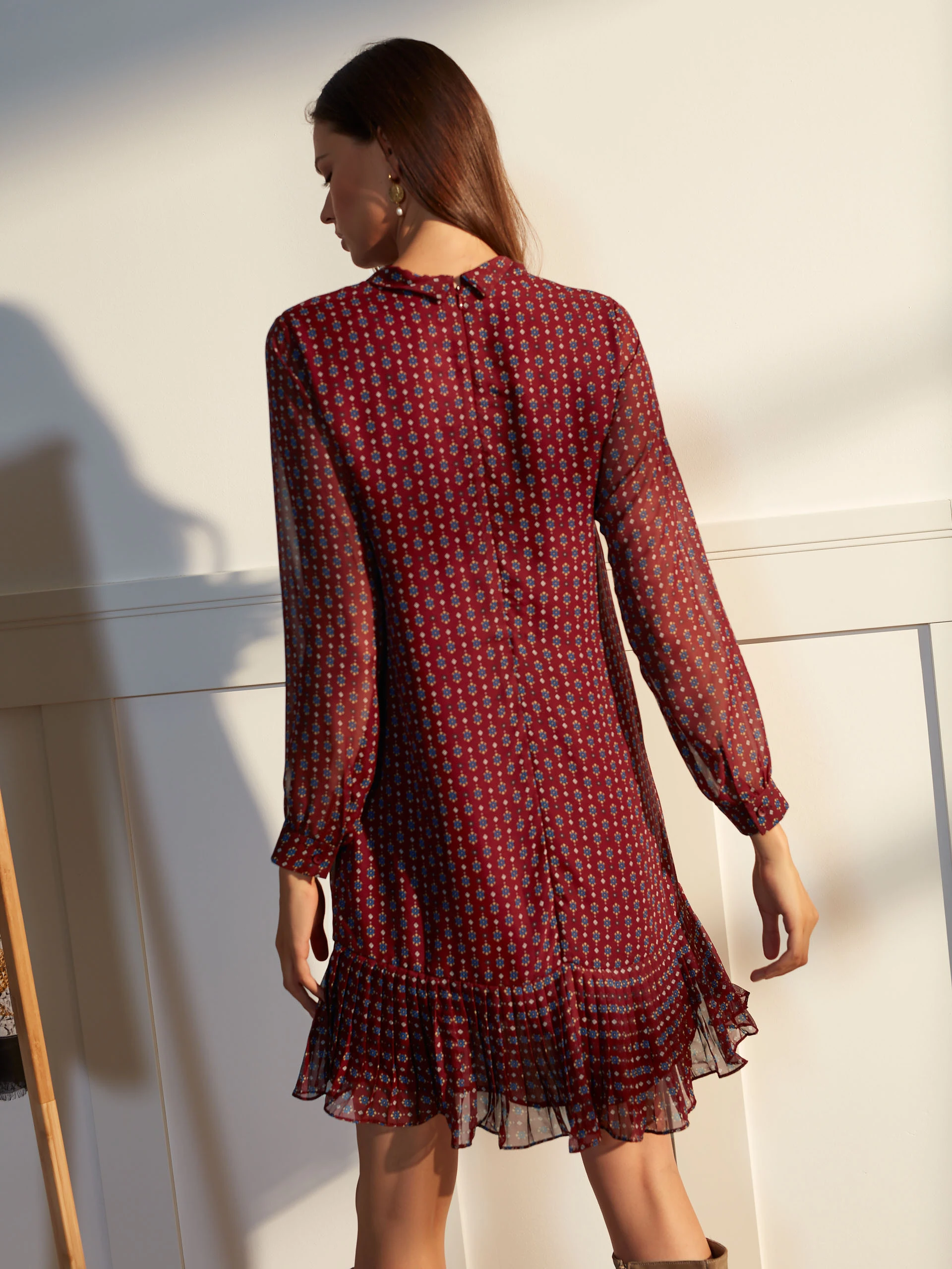 DRESS WITH A RUFFLE AT THE BOTTOM