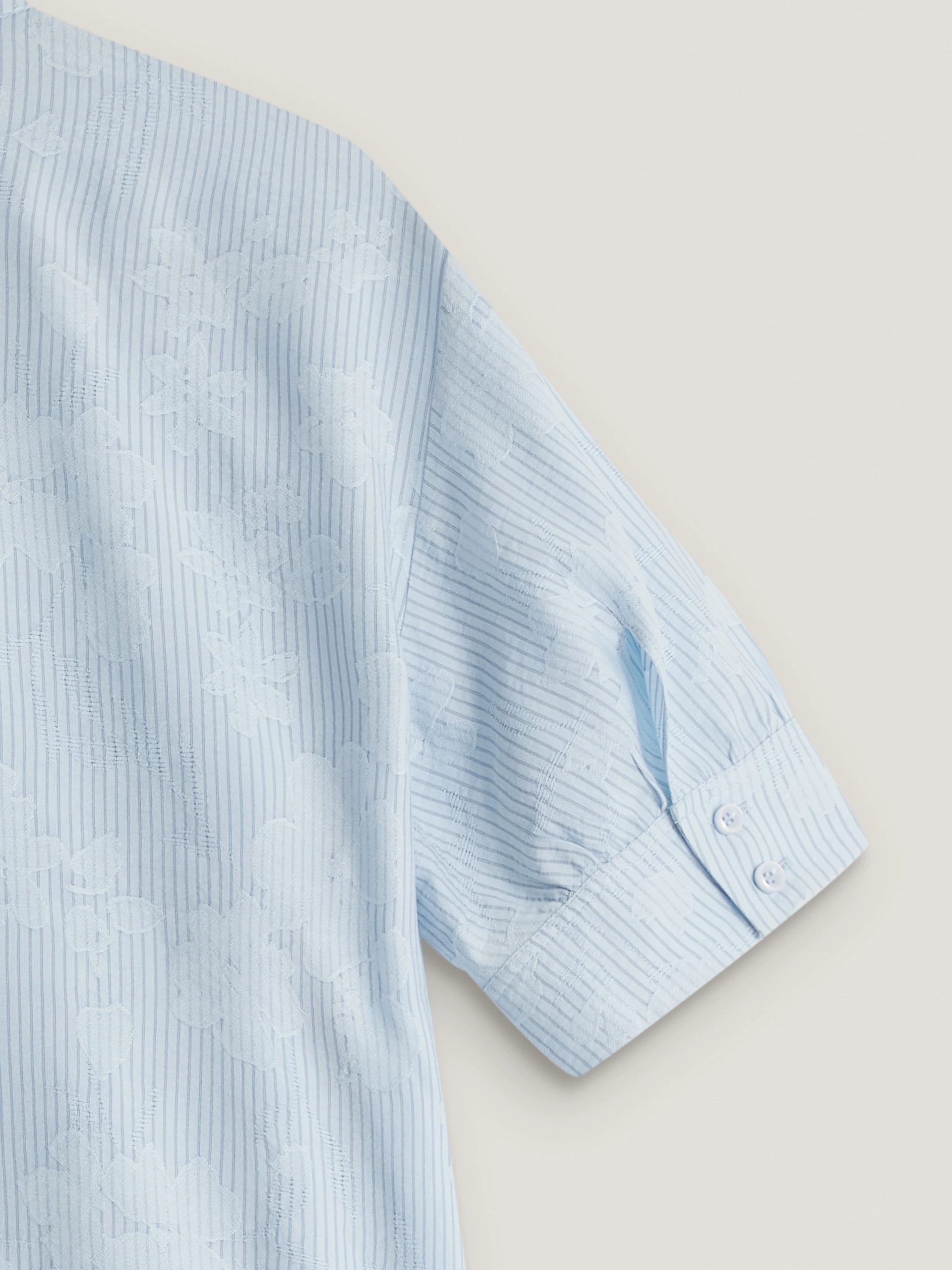 A blue short-sleeved shirt