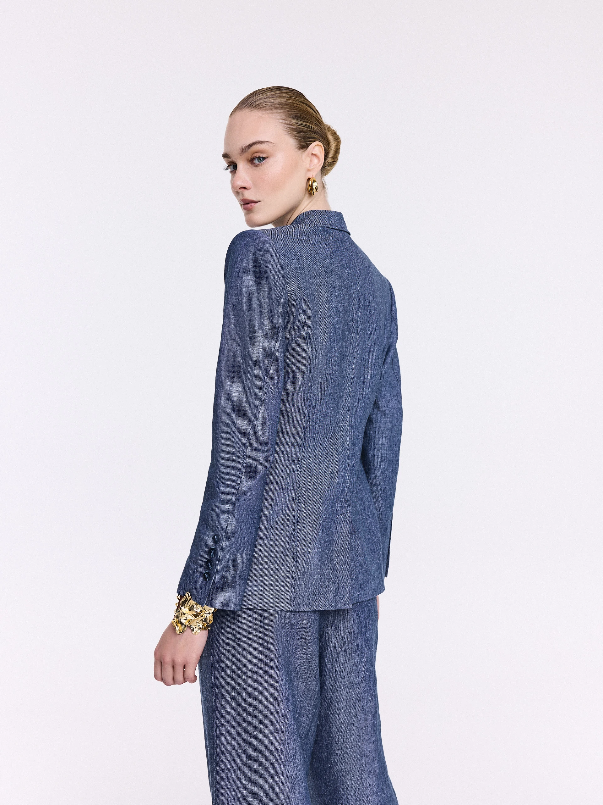 Navy blue linen and cotton blazer with a decorative flower