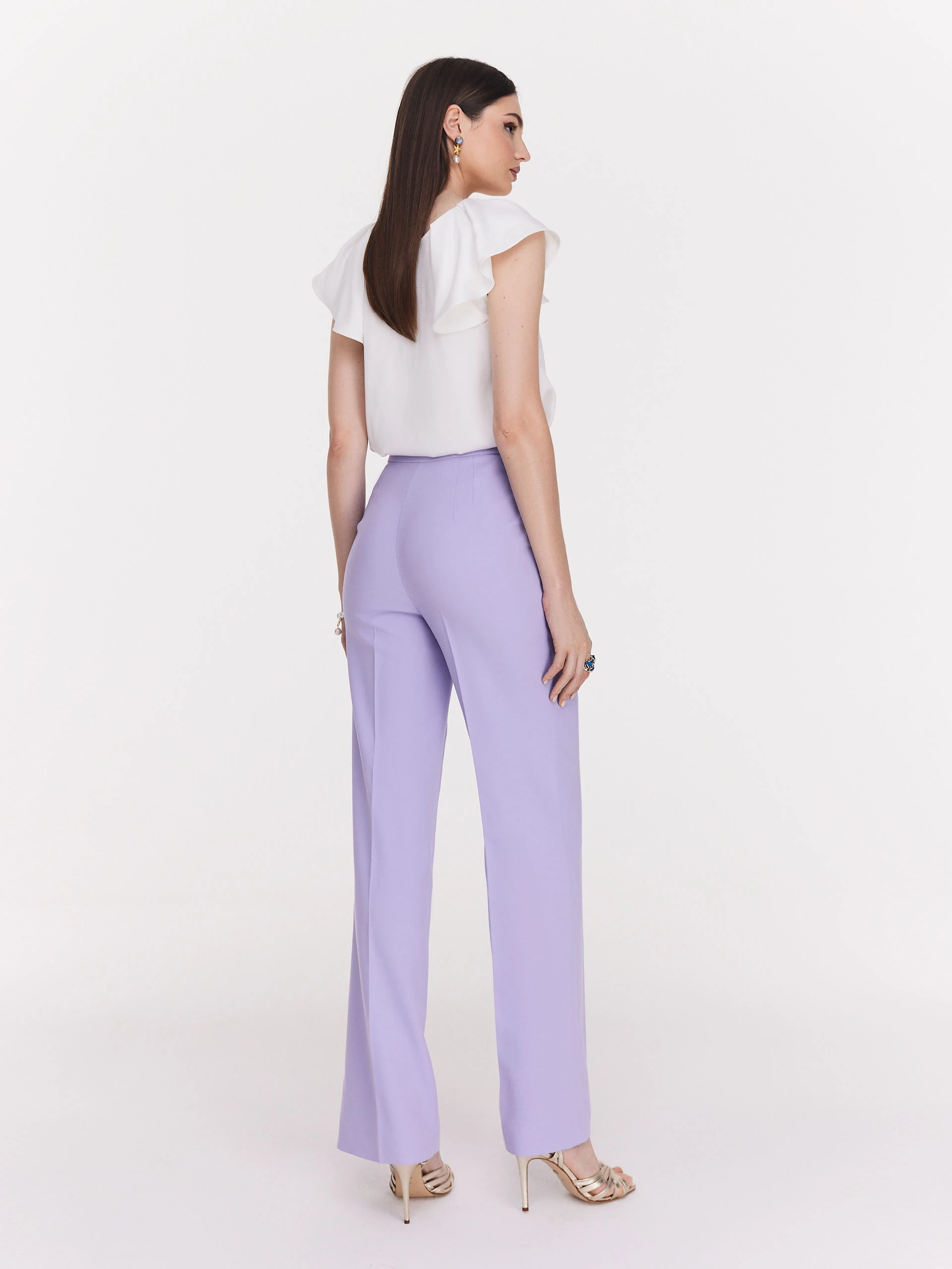 Loose white blouse with ruffle