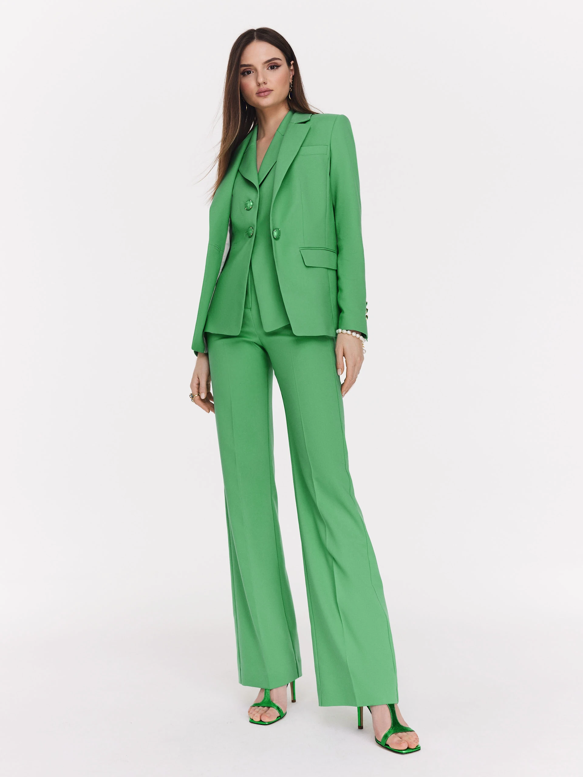 Classic green jacket with a single button closure
