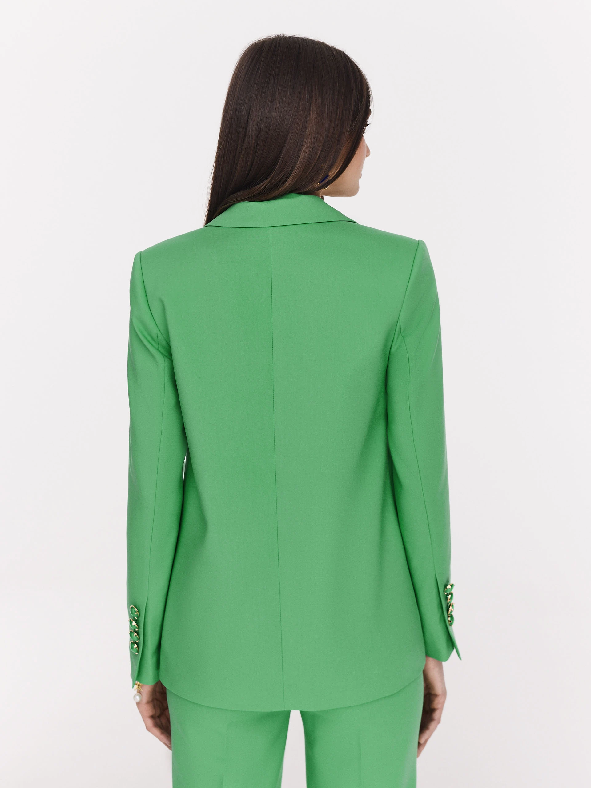 Classic green jacket with a single button closure