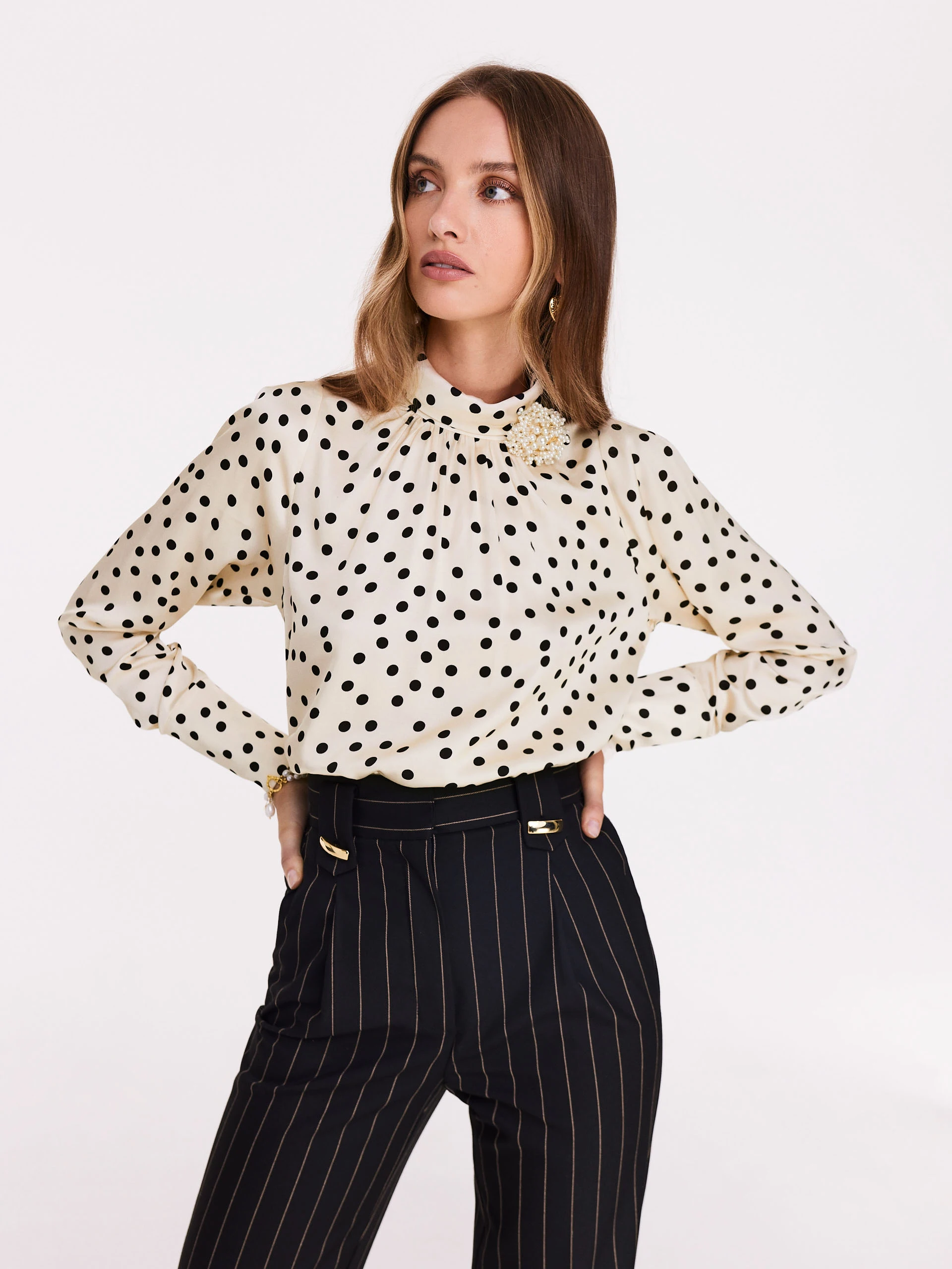 Cream pea blouse with pearl brooch