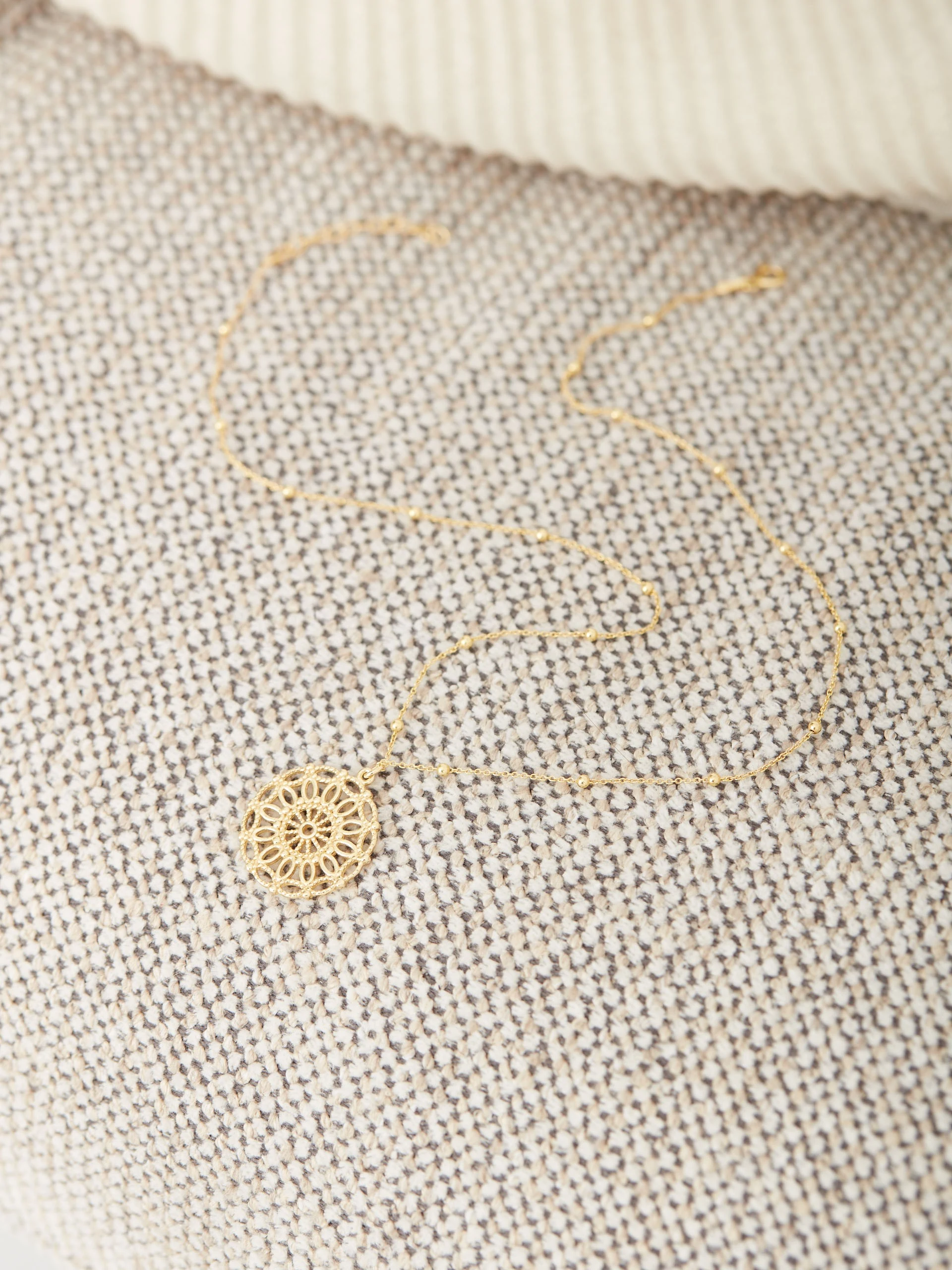 NECKLACE WITH OPENWORK CHARM