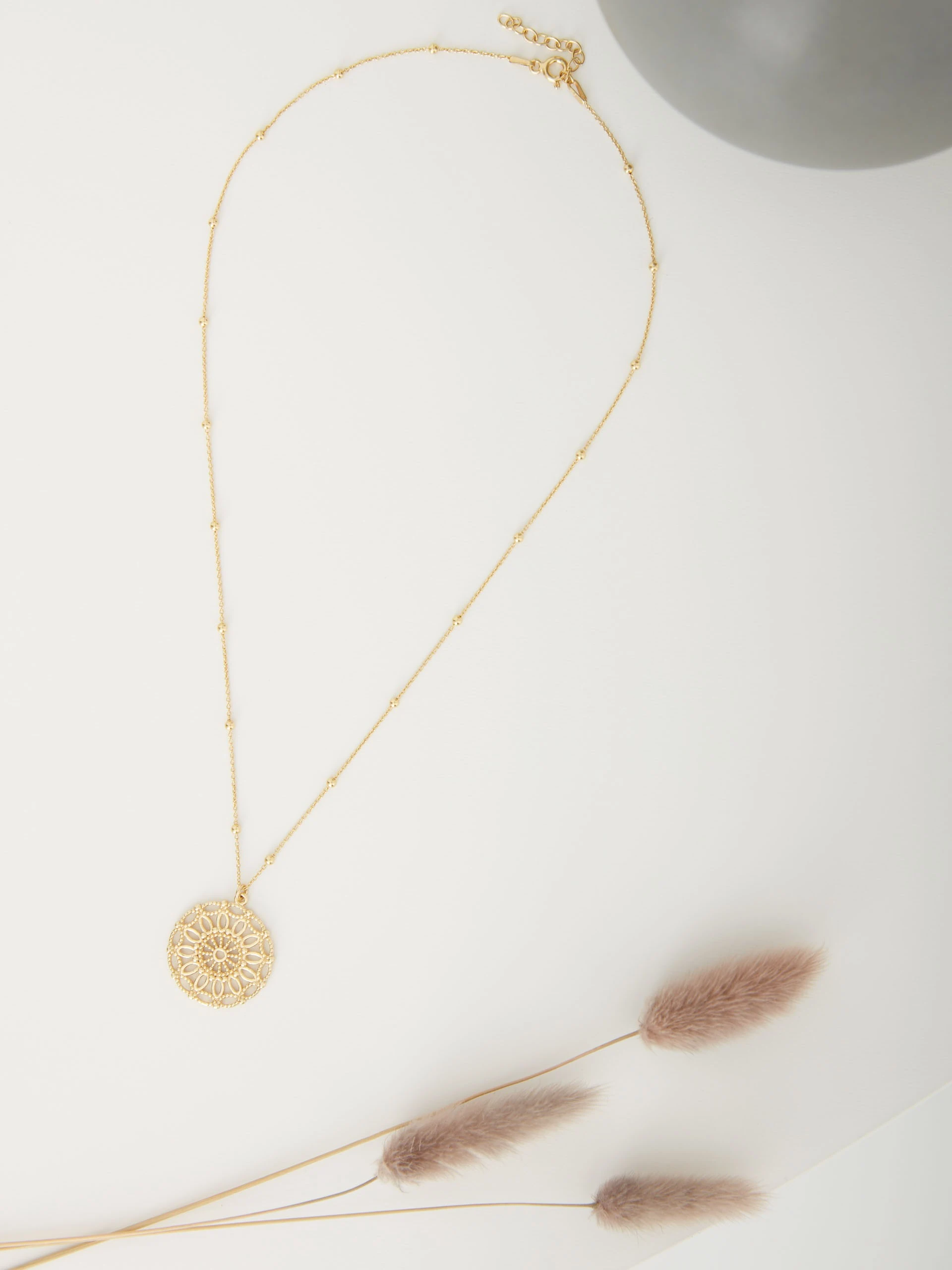 NECKLACE WITH OPENWORK CHARM