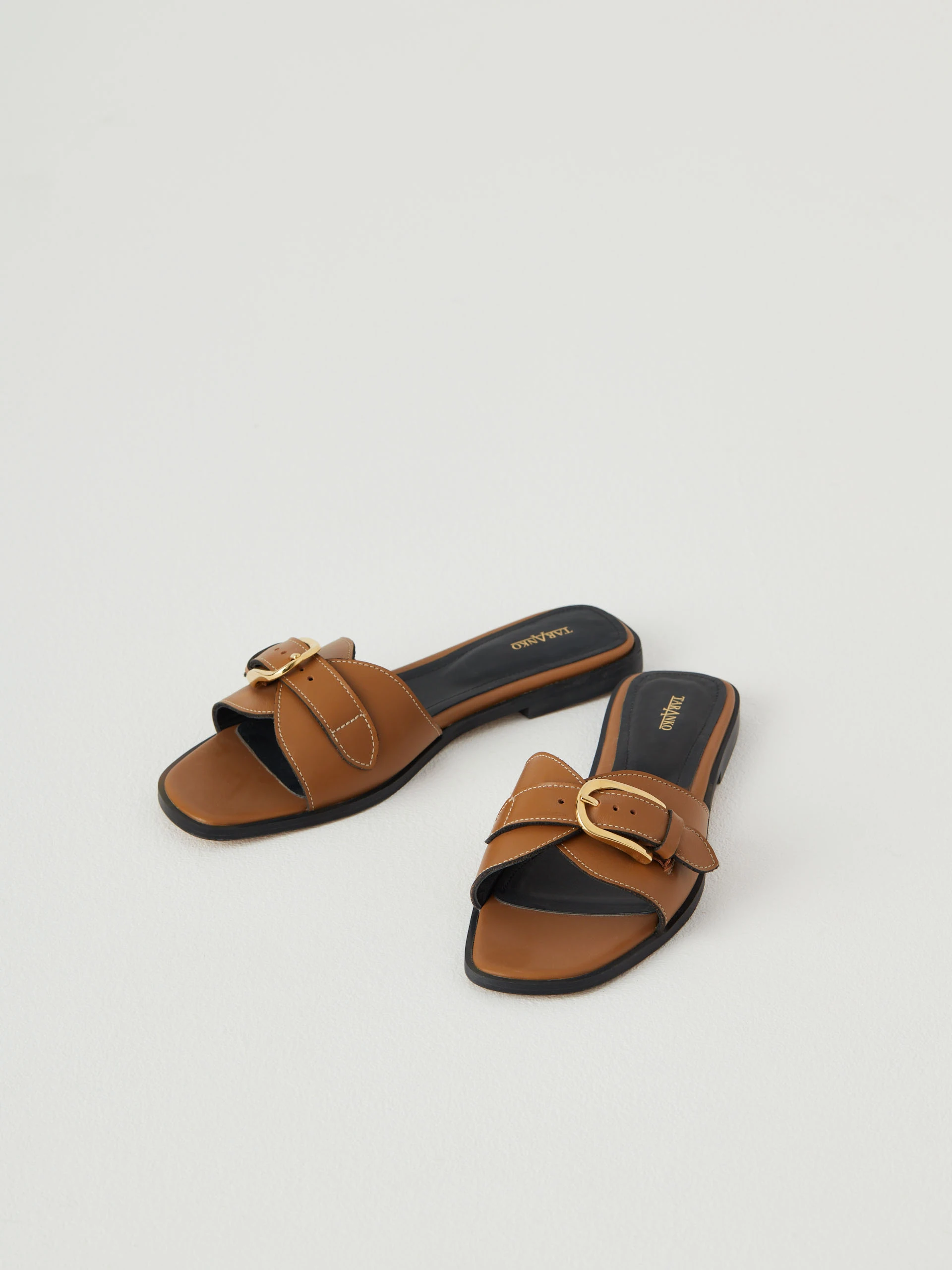 Brown flip-flops on a flat sole