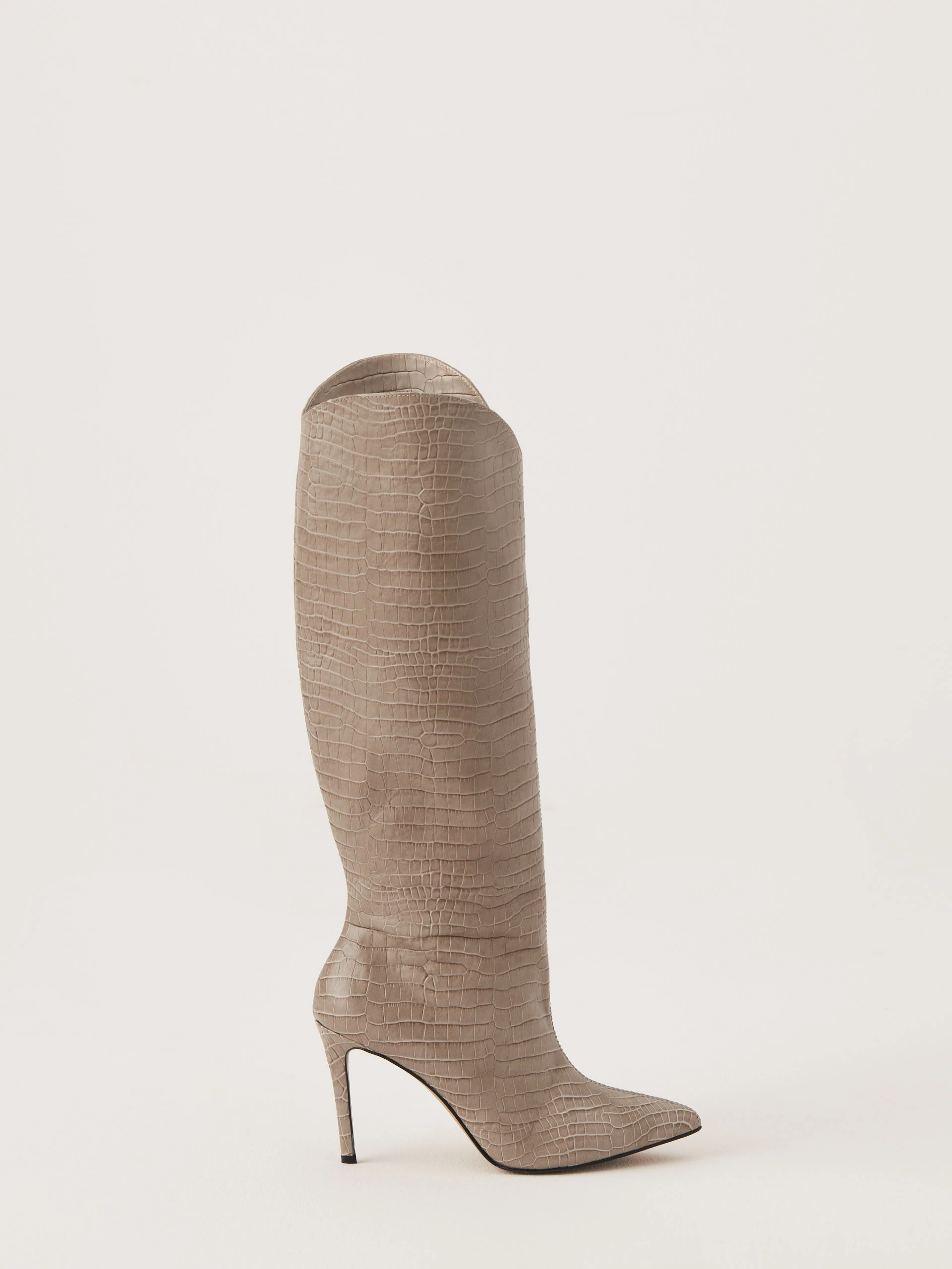 Beige stiletto heeled boots