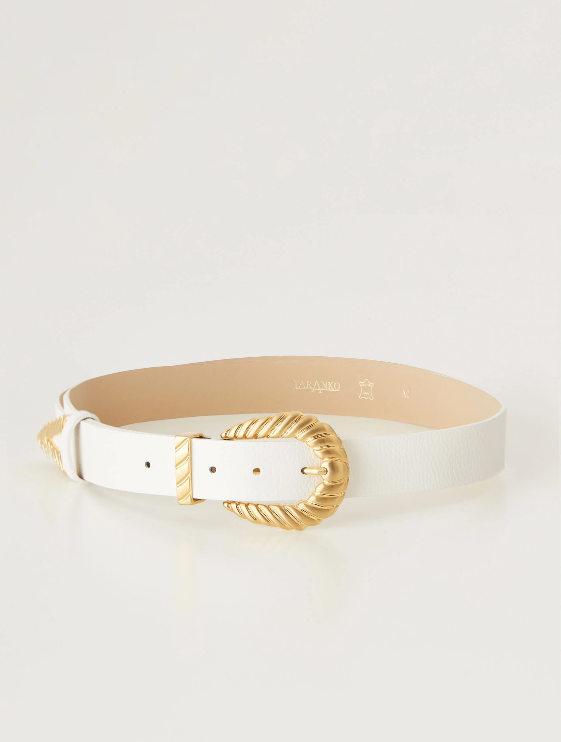 White belt with gold buckle