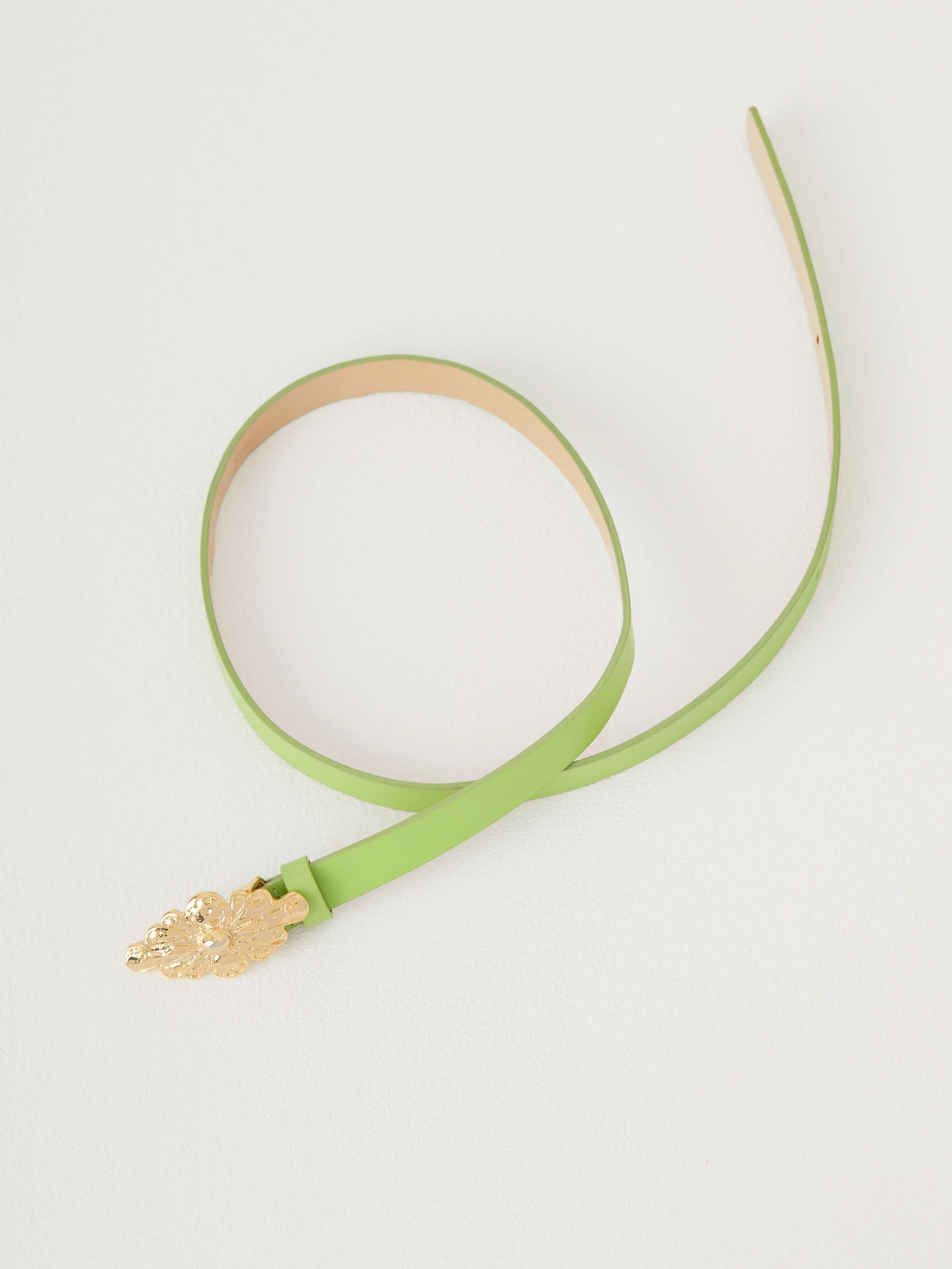 Lime green belt with decorative buckle