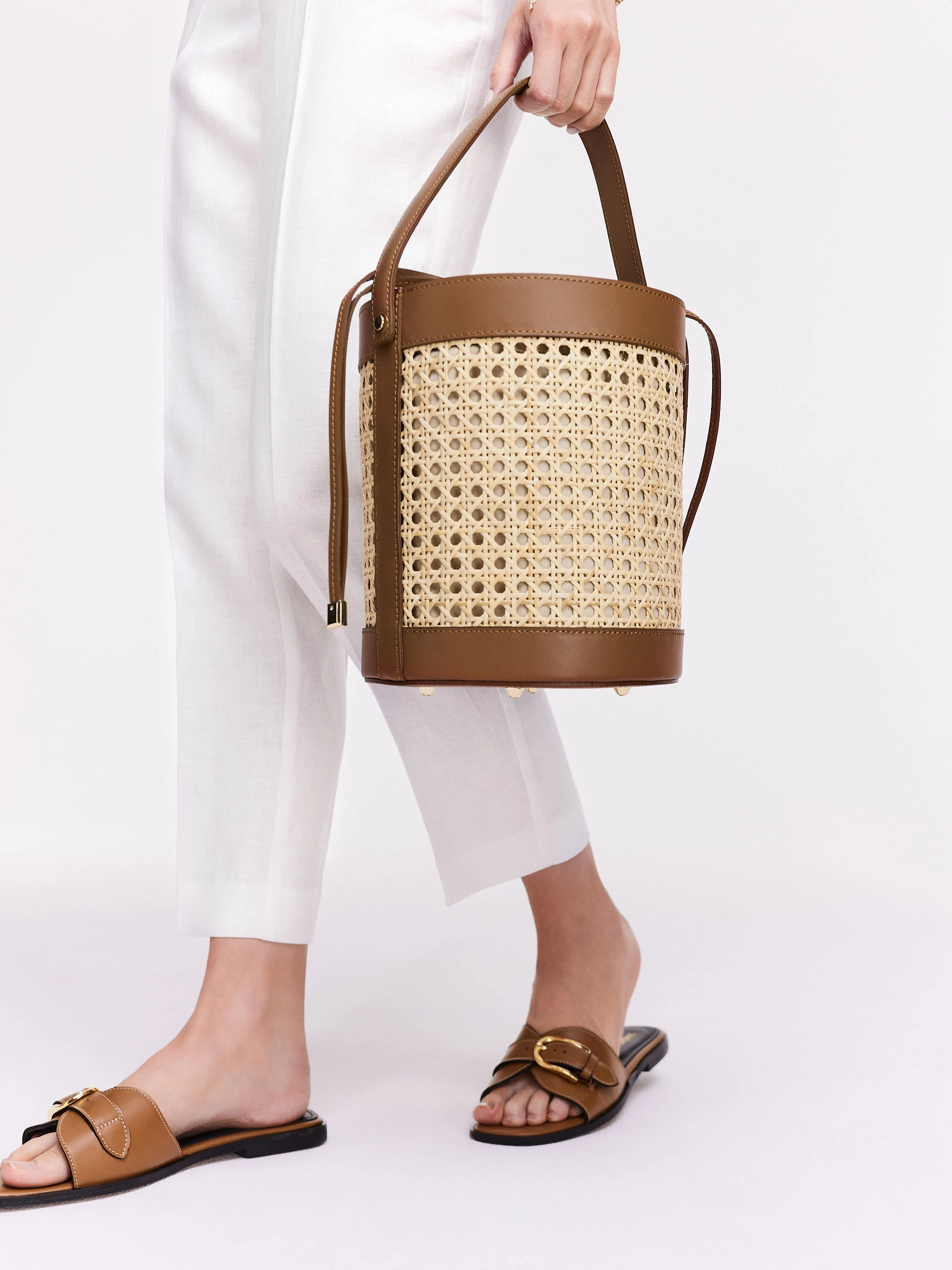 Leather and raffia bucket bag