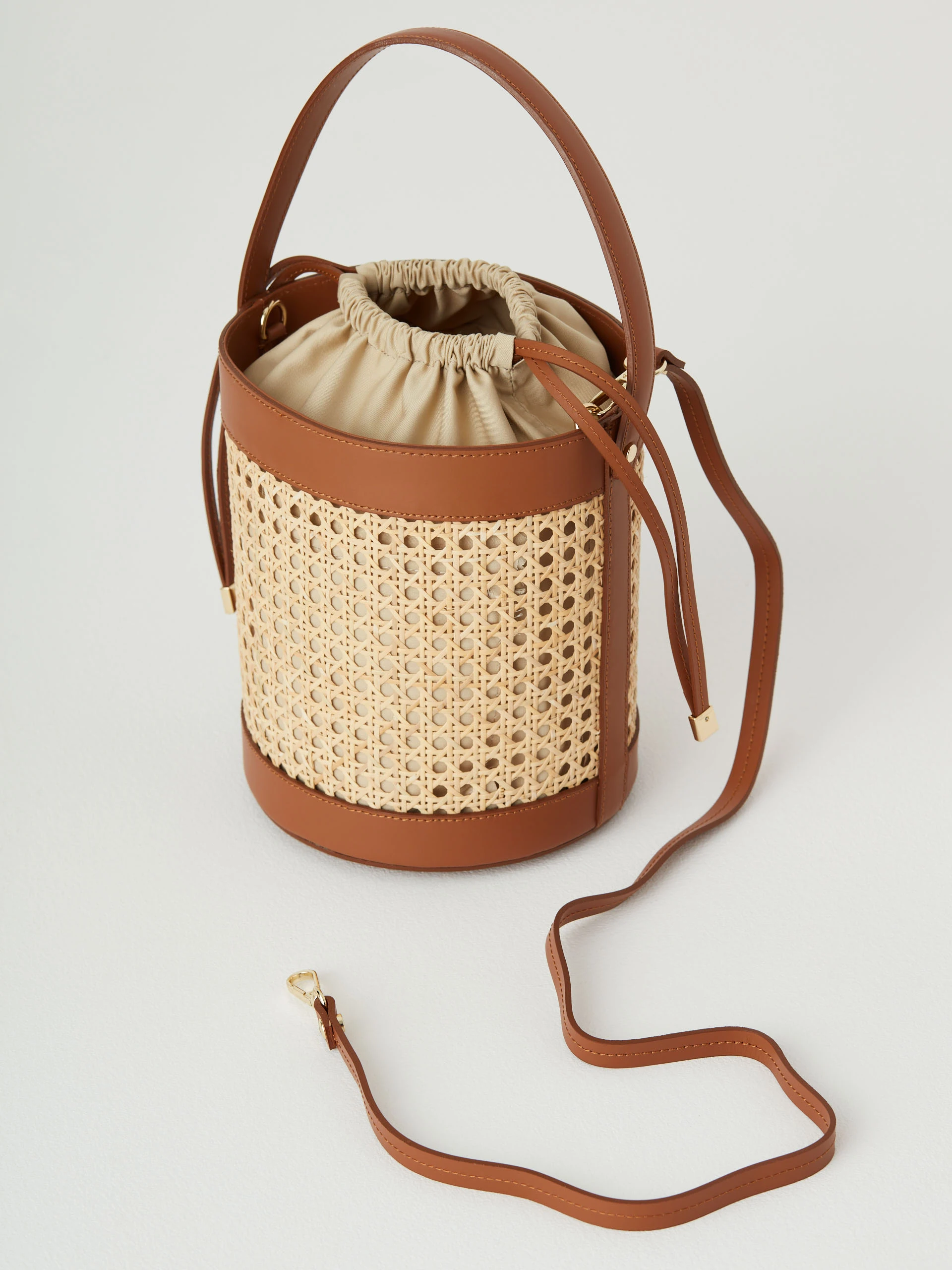 Leather and raffia bucket bag