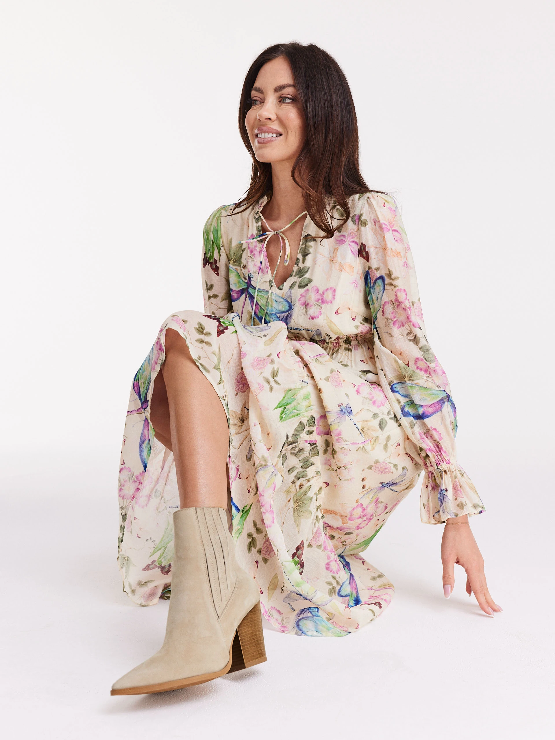 Beige leather heeled cowboy boots