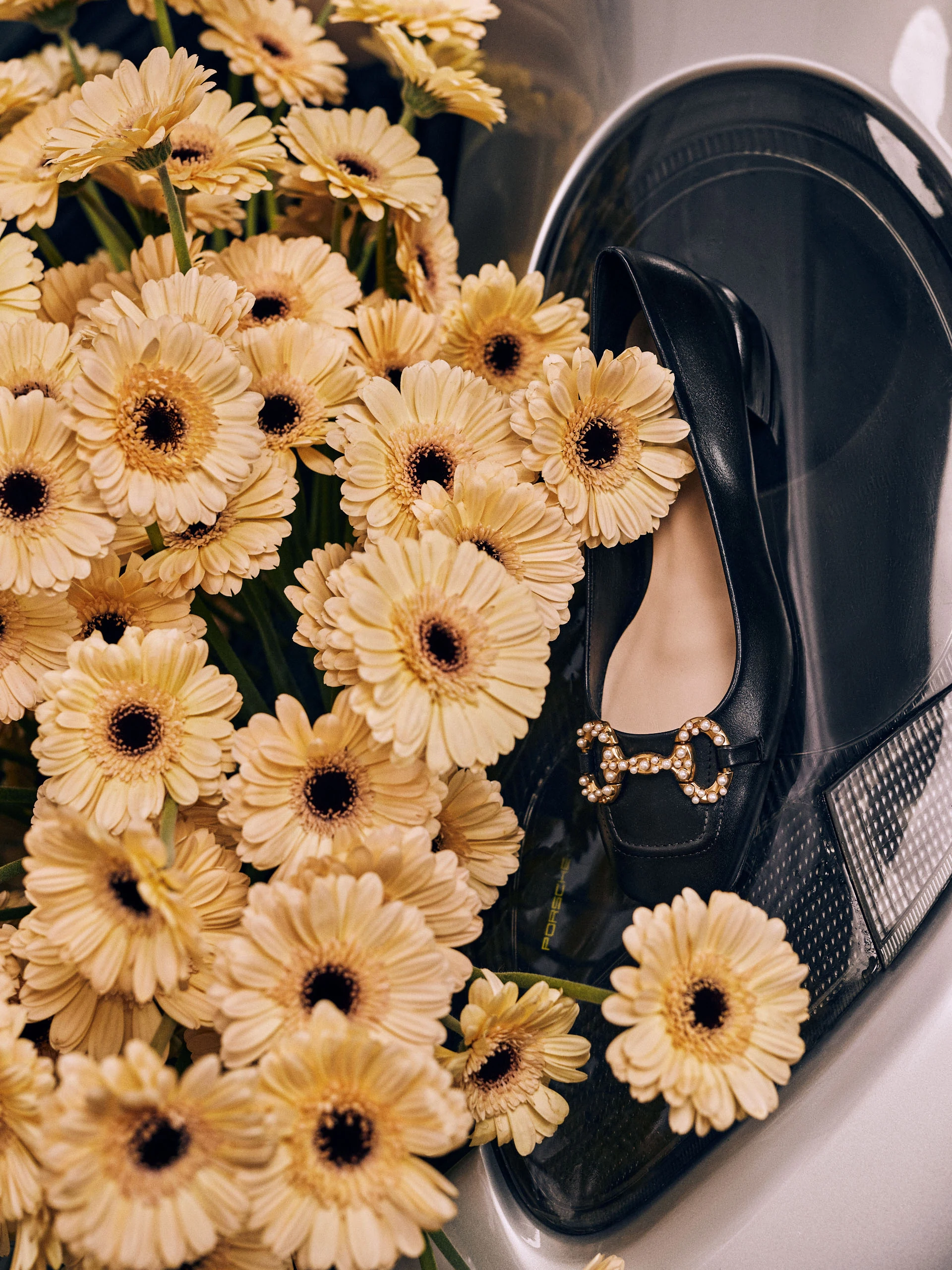 Black leather ballerinas decorated with buckles