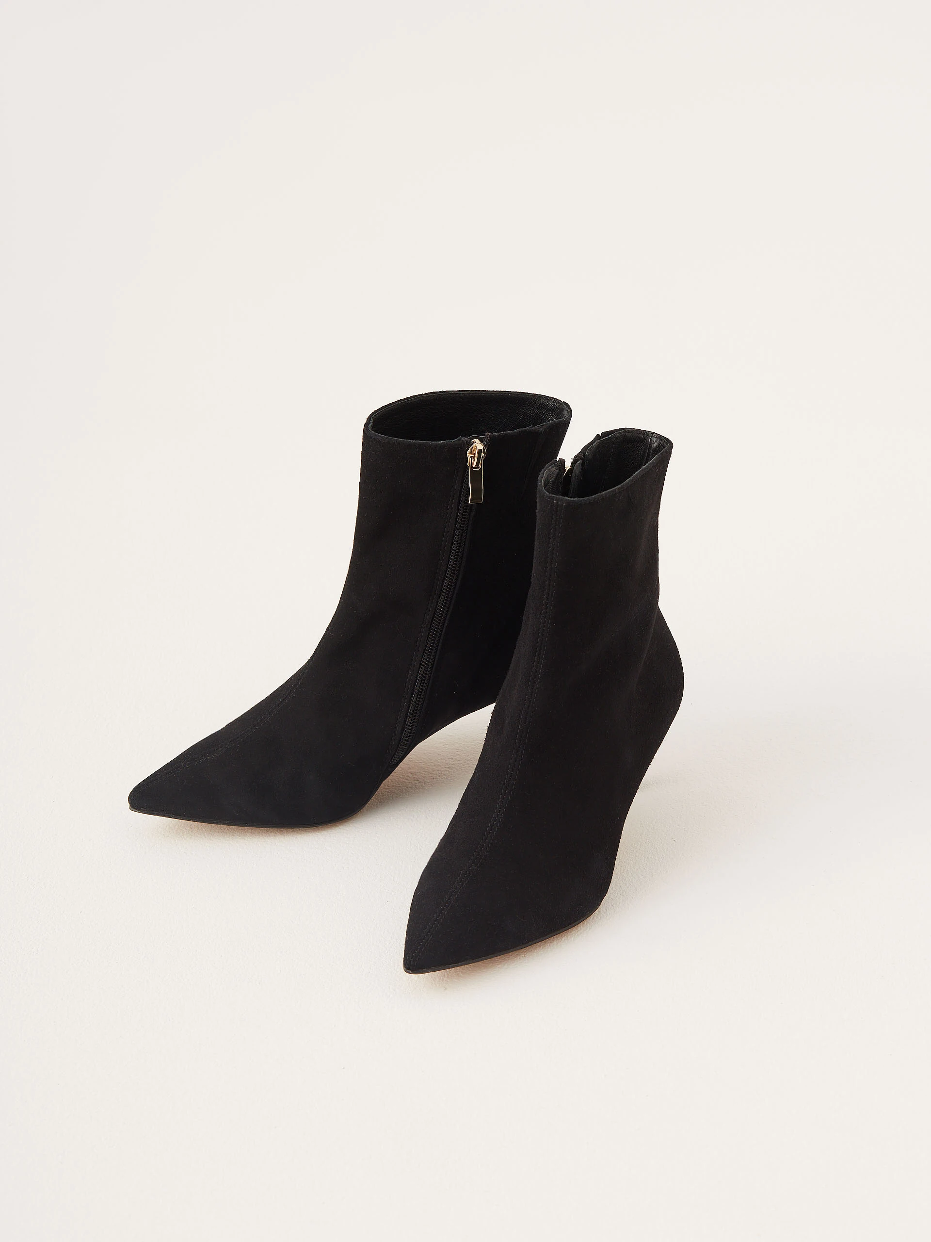 Black suede boots with gold elements
