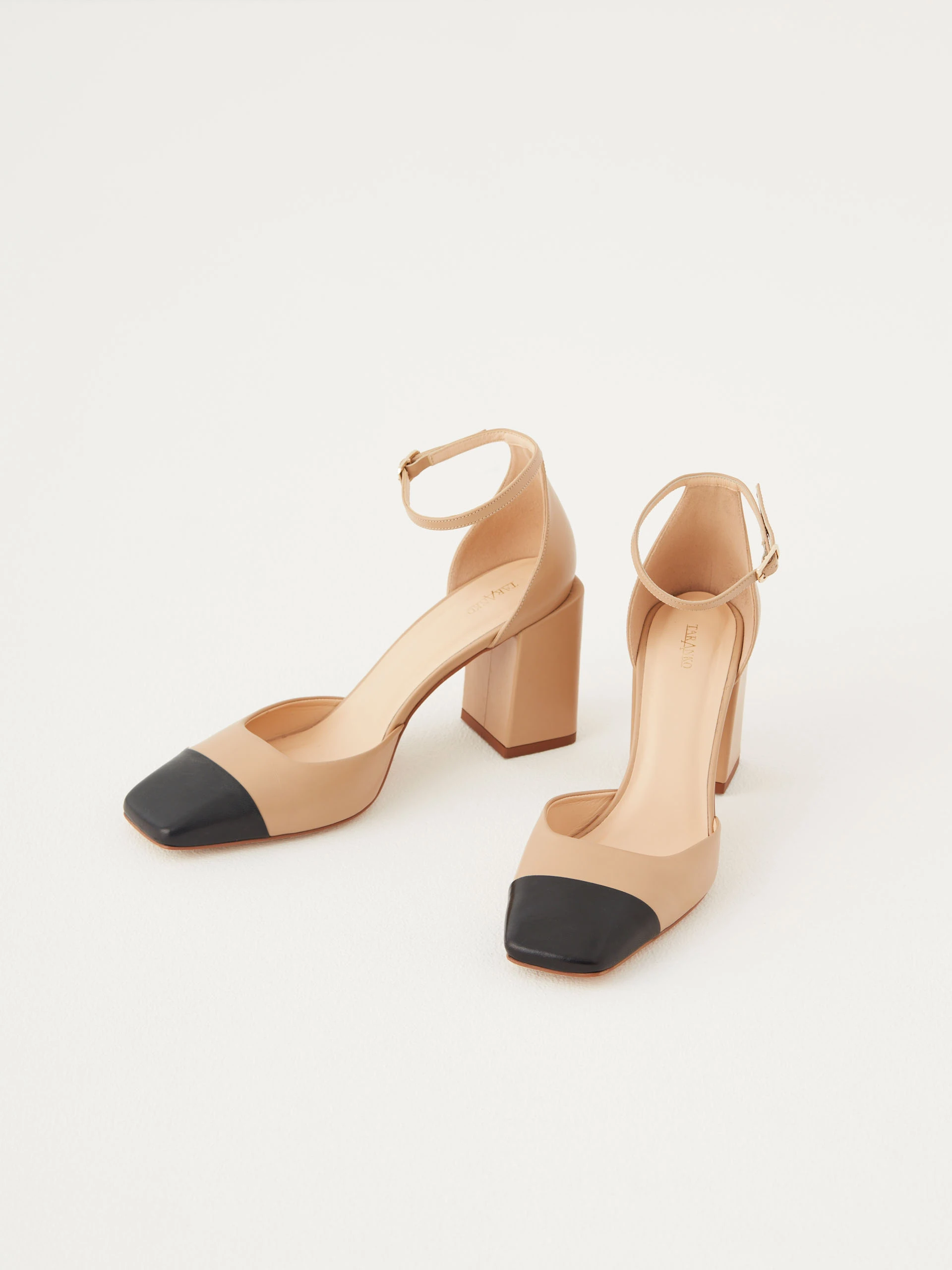 Beige leather pumps with square toes